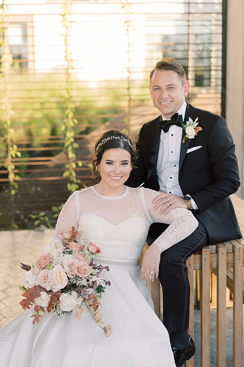 bride and groom portrait in pool area