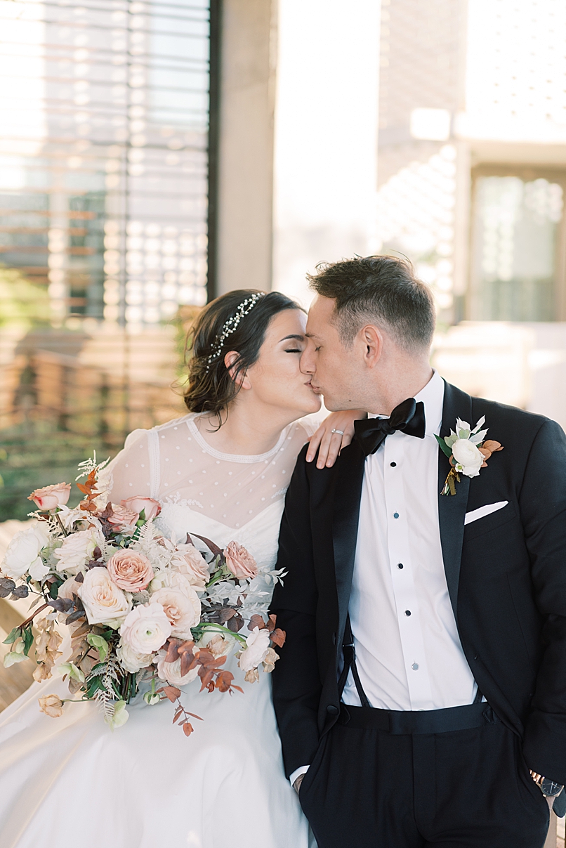 bride and groom portrait in pool area