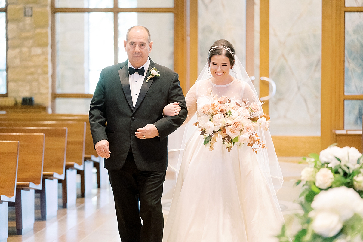 bride and her father walking