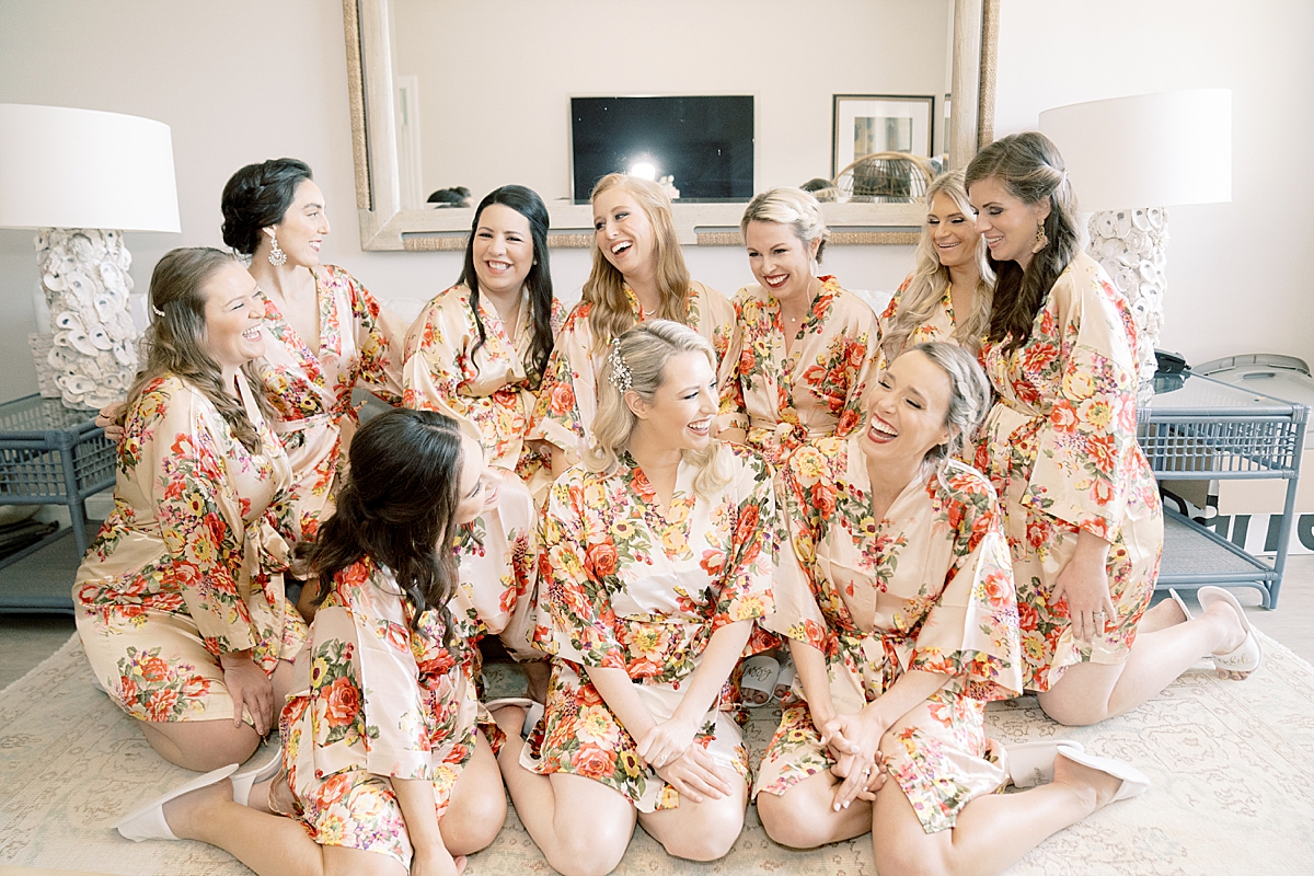 bridesmaids in robes laughing