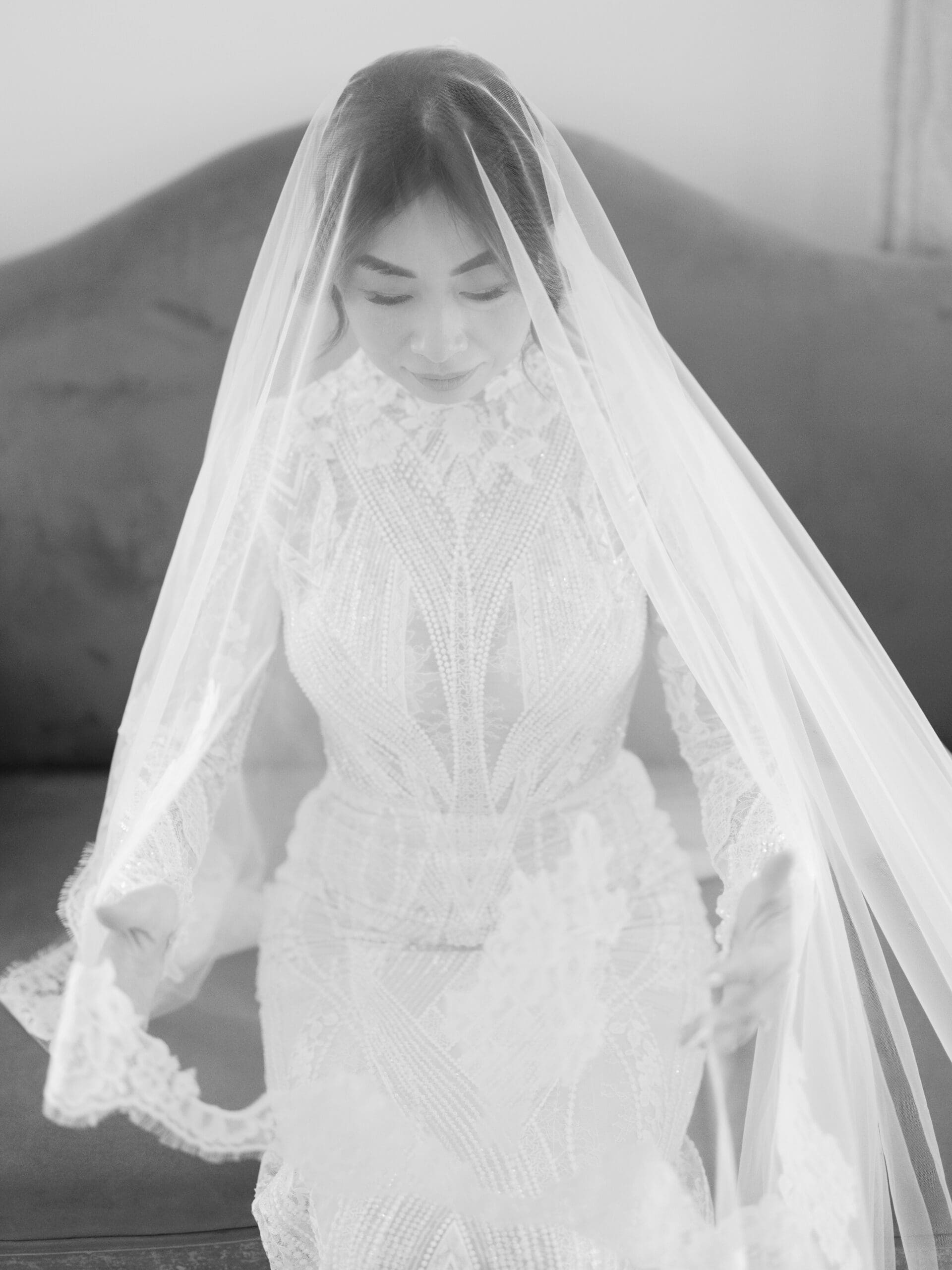Bride getting ready in the bridal suite at The Addison Grove, joyful candid moments and soft natural light
