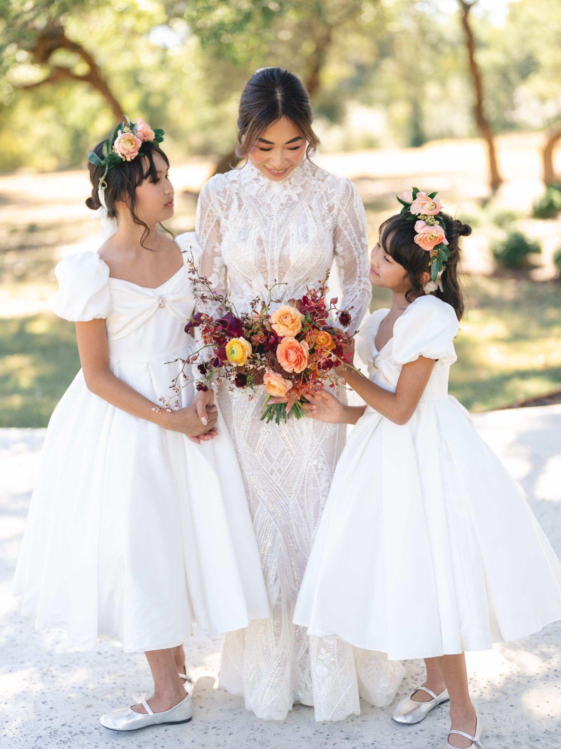 Romantic portrait of Oanh and Jeremy under the oak trees at The Addison Grove, captured on film