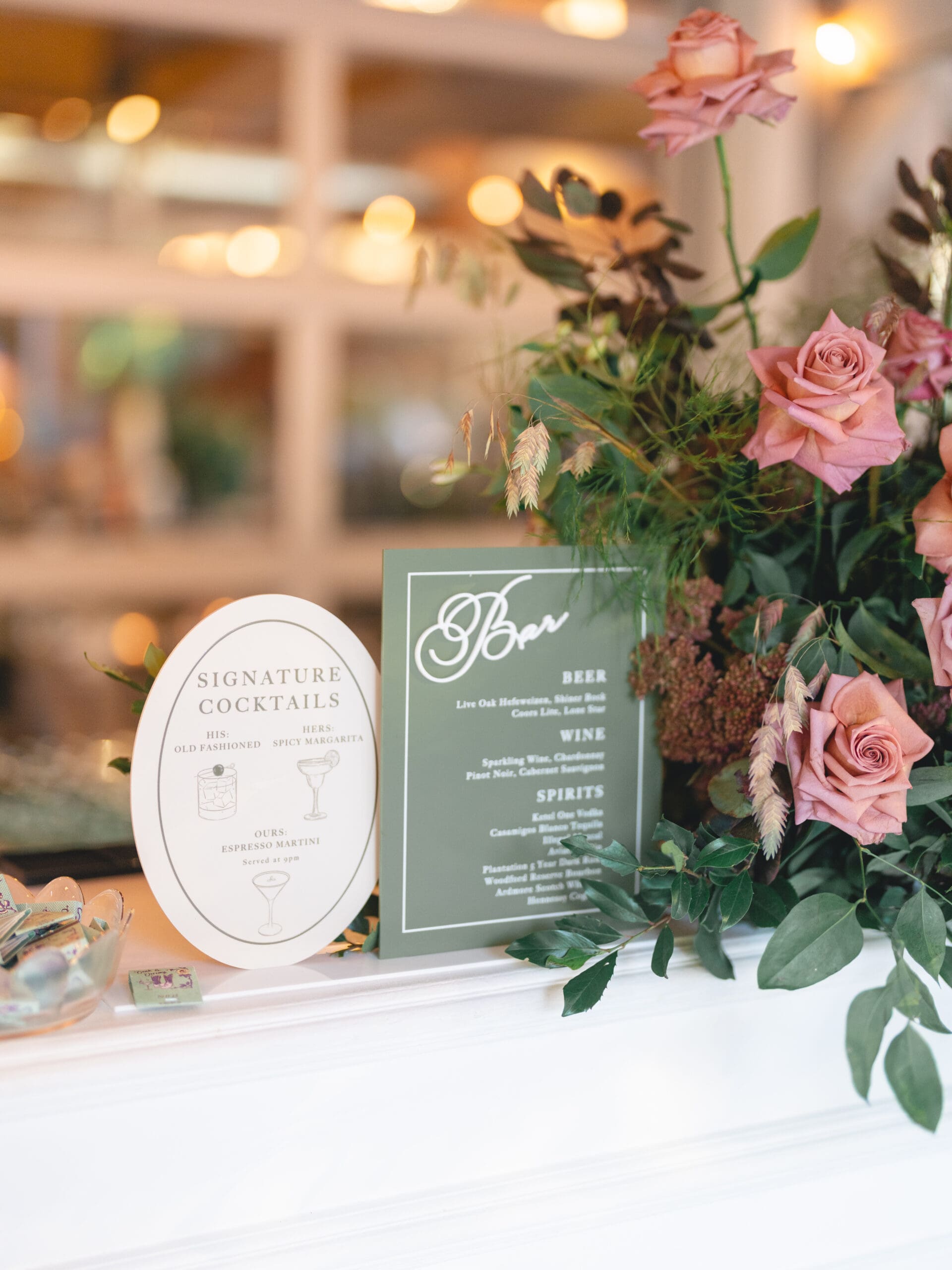 Reception details with floral centerpieces, candlelight, and elegant table settings at The Addison Grove