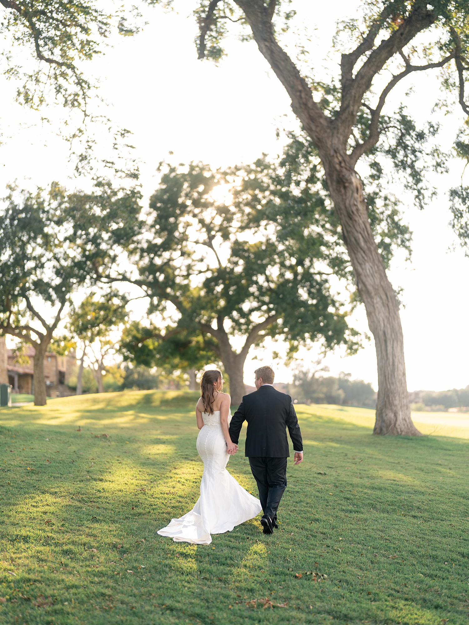 bride and groom romantic portraits at sunset at Escondido Golf Club
