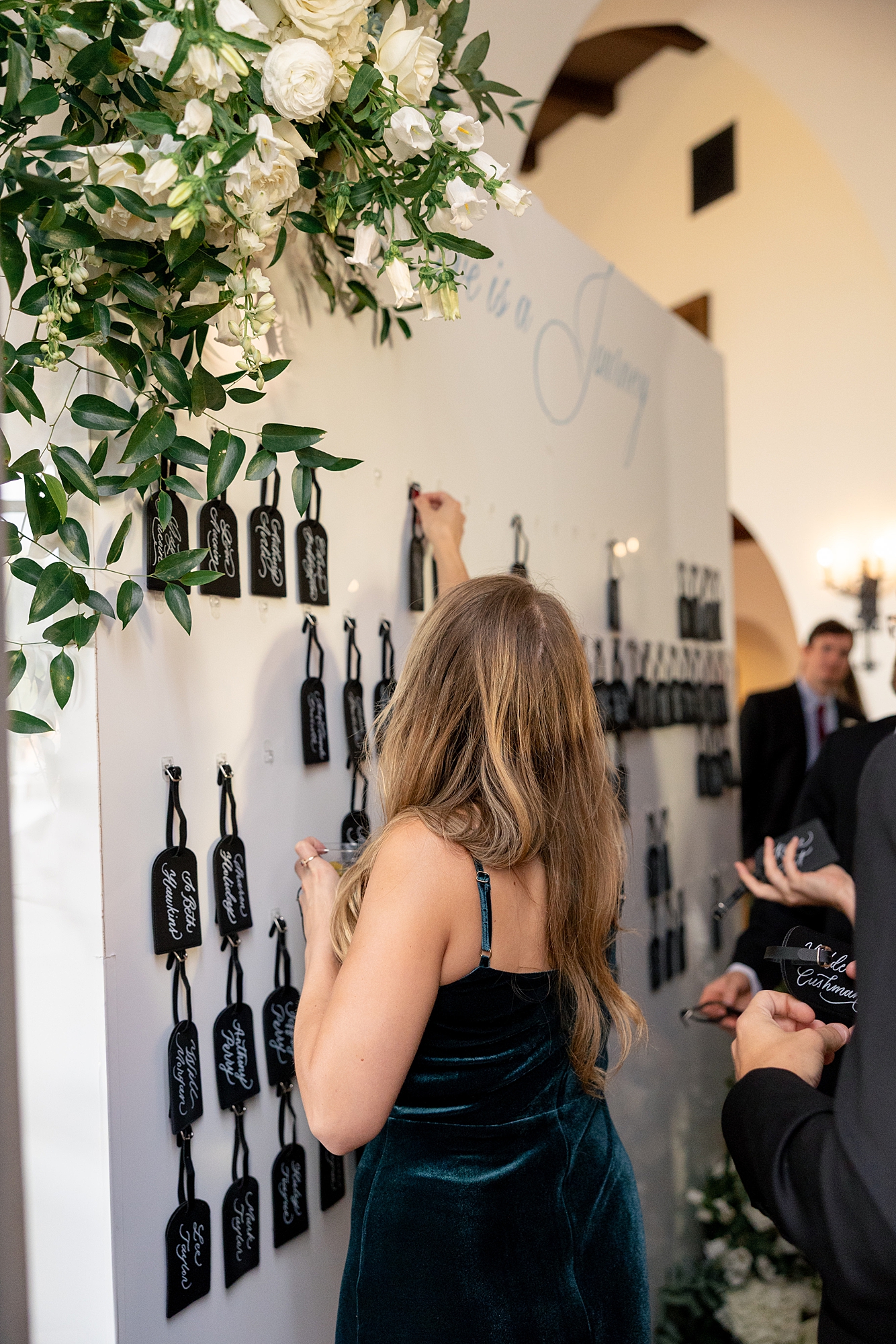 Reception tablescape with elegant linens, florals and candles at Escondido Golf Club