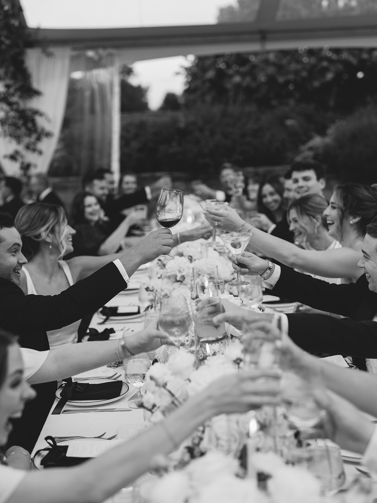 wedding guests dancing and celebrating at Escondido Golf Club wedding by Paige Vaughn Photo