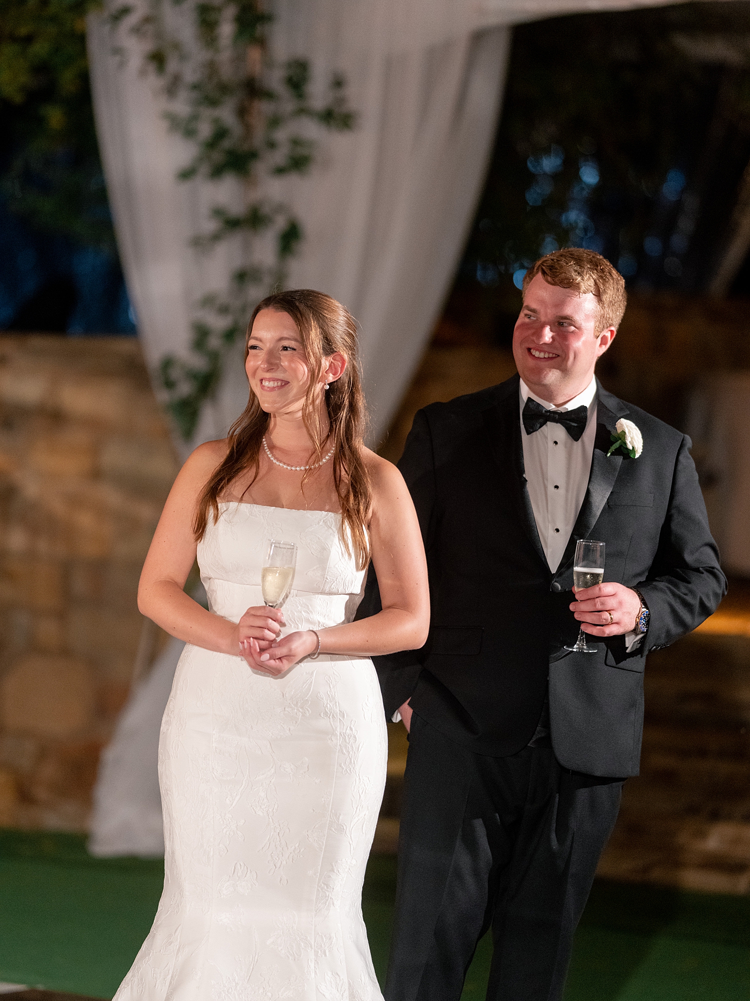 wedding guests dancing and celebrating at Escondido Golf Club wedding by Paige Vaughn Photo