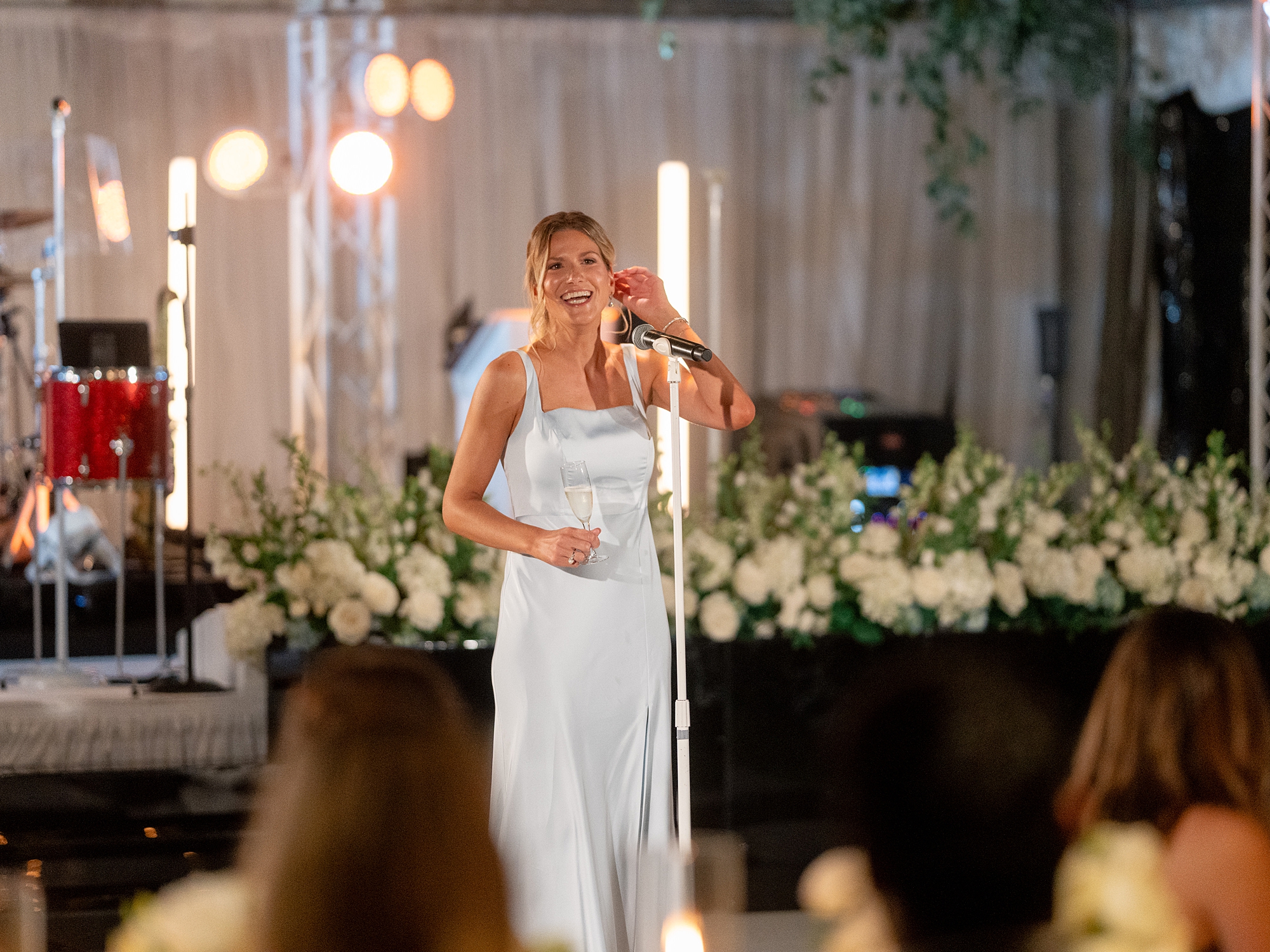 wedding guests dancing and celebrating at Escondido Golf Club wedding by Paige Vaughn Photo