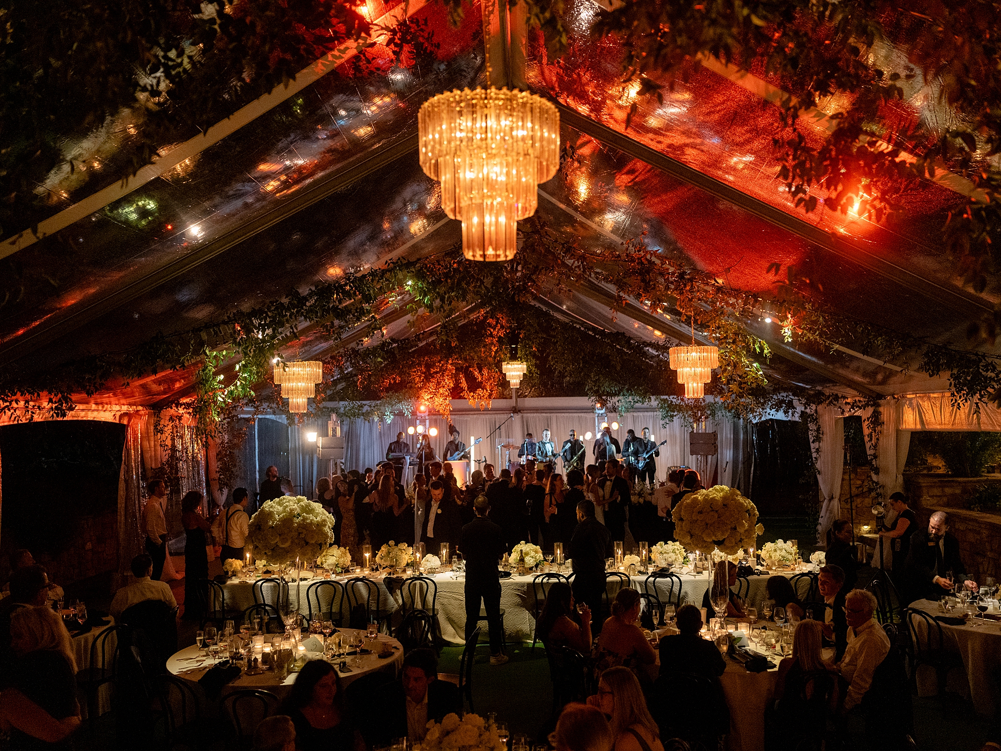 wedding guests dancing and celebrating on the dance floor at Escondido Golf Club wedding by Paige Vaughn Photo