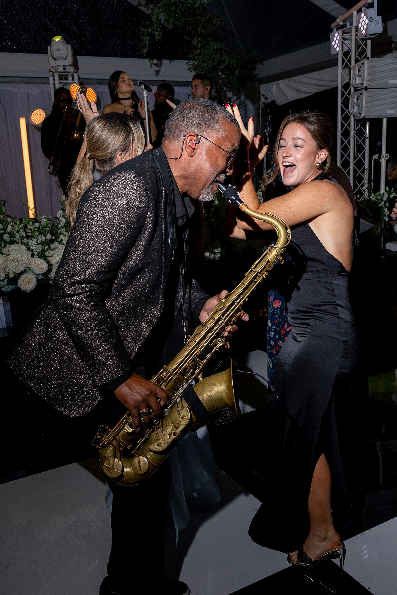 wedding guests dancing and celebrating on the dance floor at Escondido Golf Club wedding by Paige Vaughn Photo