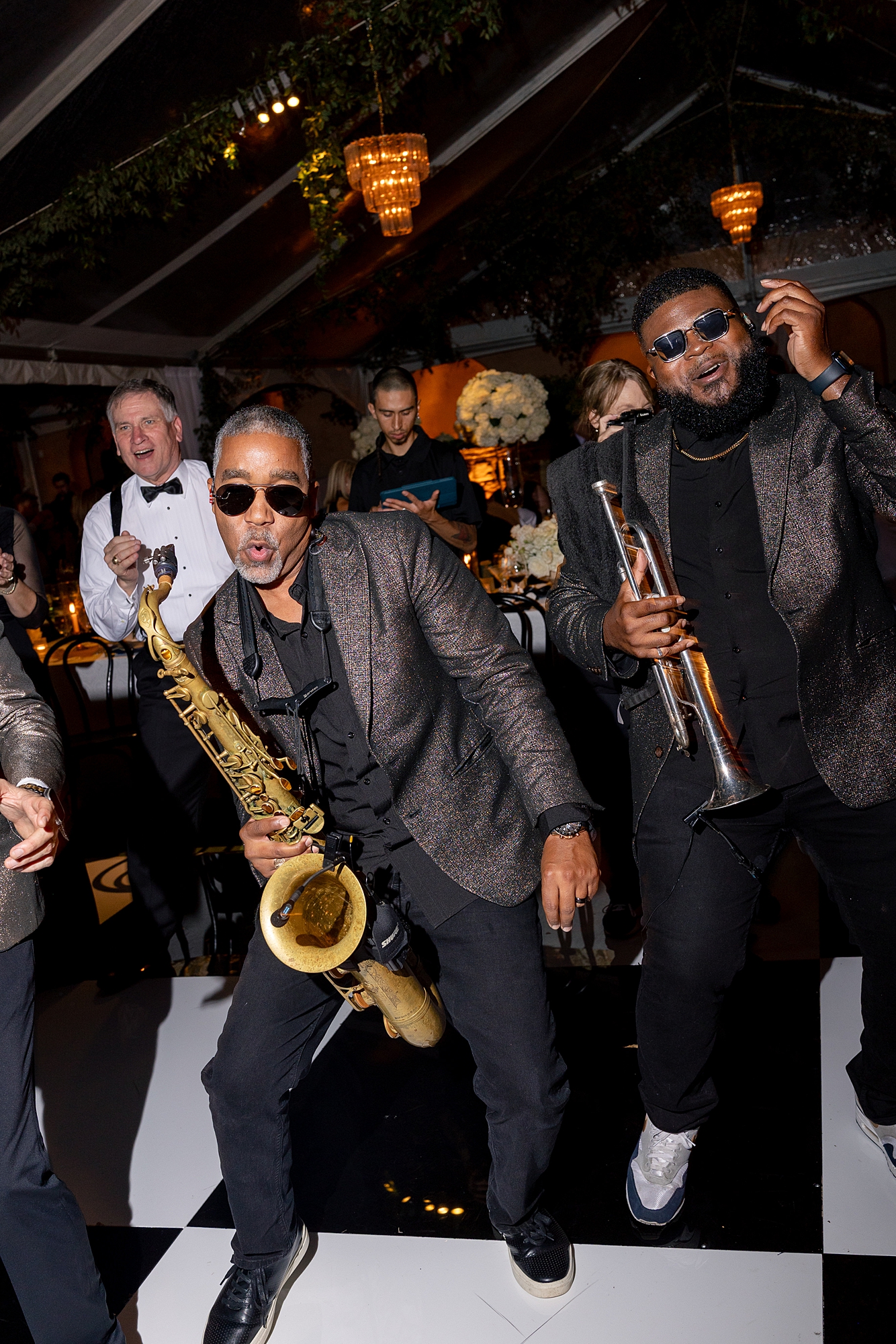 wedding guests dancing and celebrating on the dance floor at Escondido Golf Club wedding by Paige Vaughn Photo
