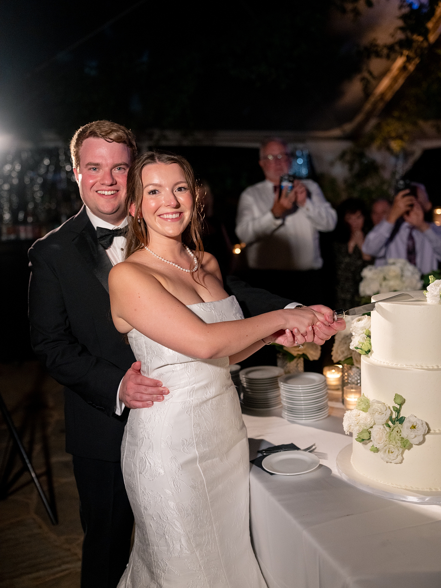 wedding guests dancing and celebrating on the dance floor at Escondido Golf Club wedding by Paige Vaughn Photo