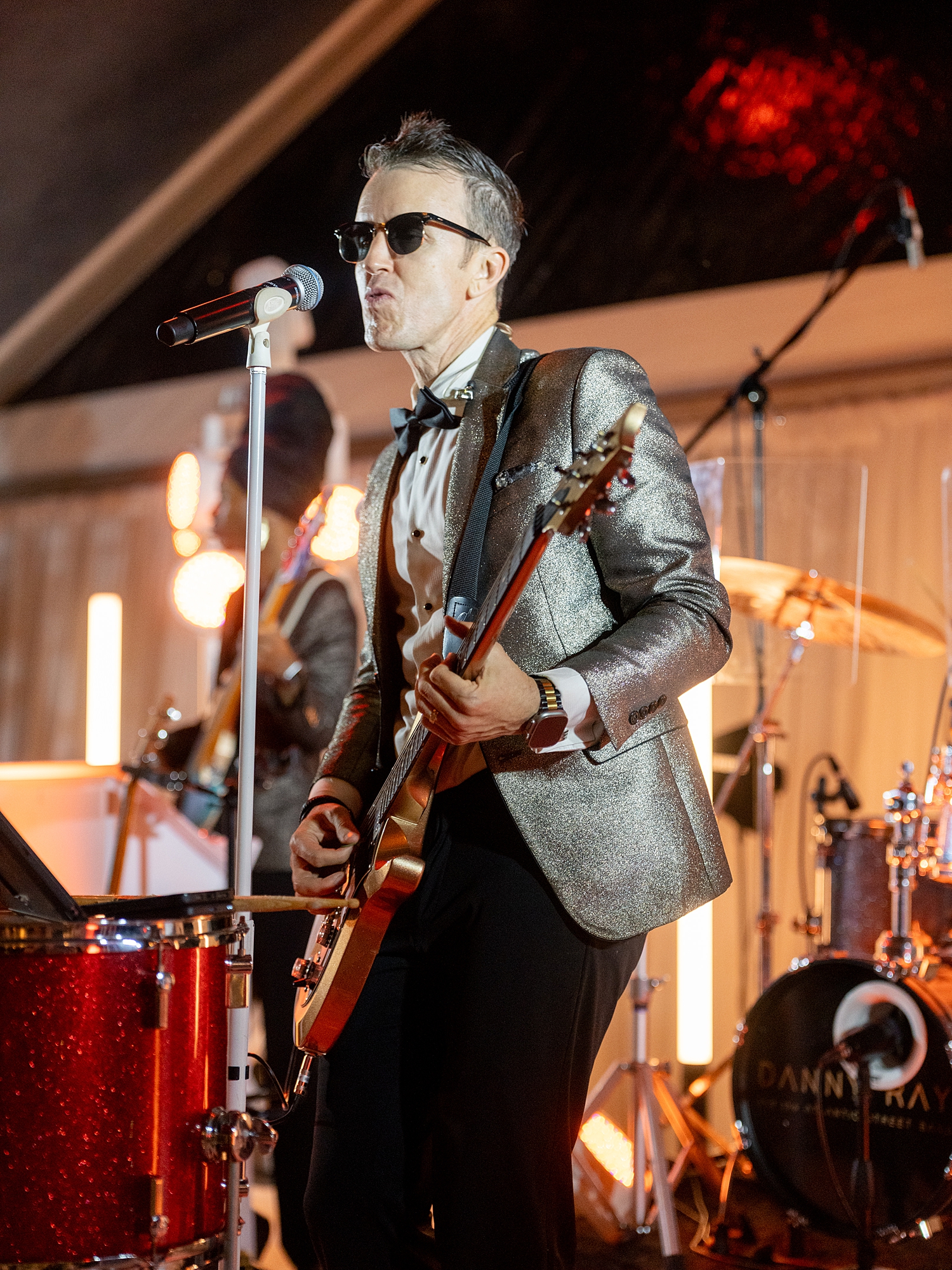 wedding guests dancing and celebrating on the dance floor at Escondido Golf Club wedding by Paige Vaughn Photo
