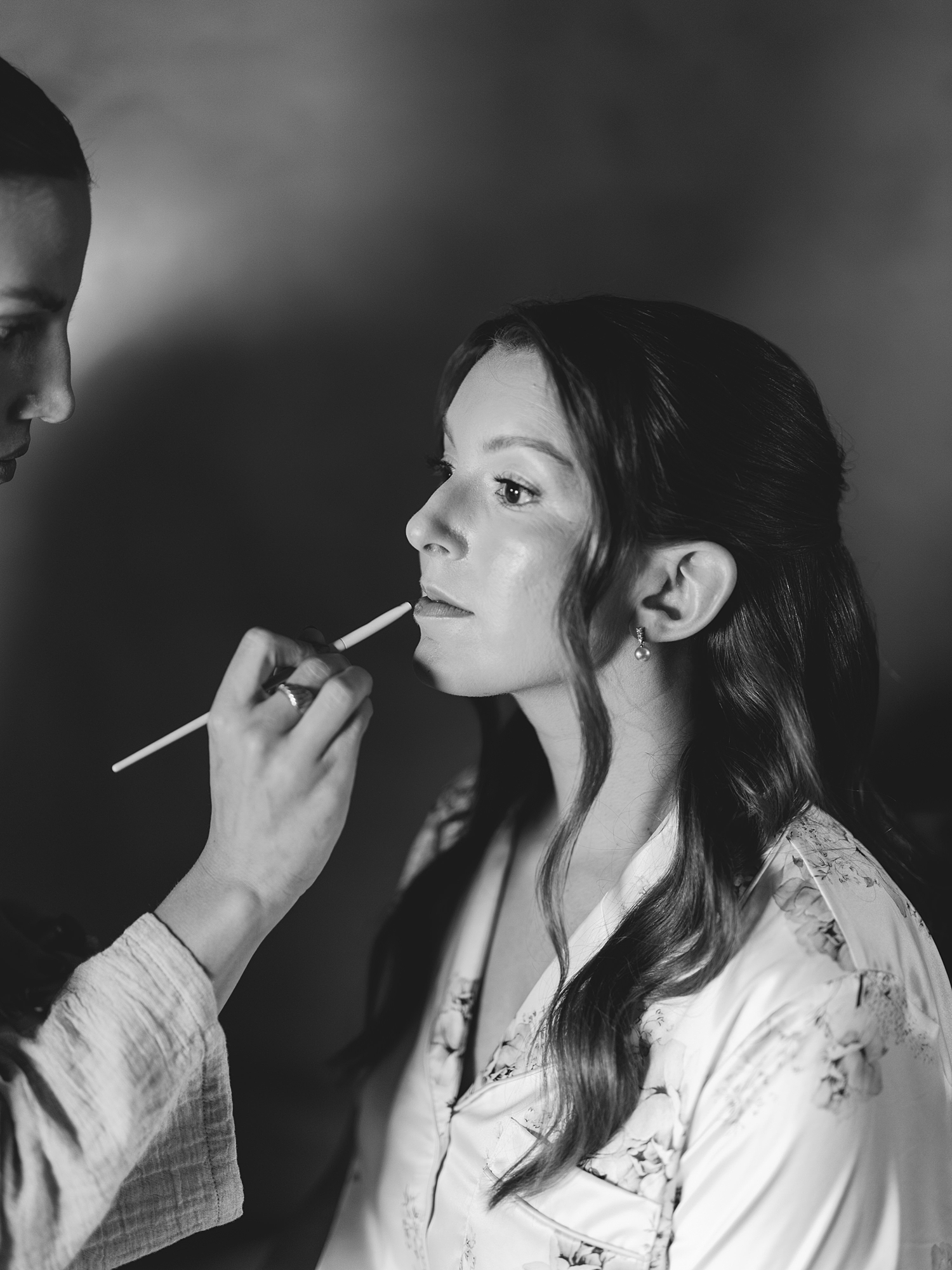 Bridal party getting ready in a sun-lit suite at Escondido Golf Club, captured on film