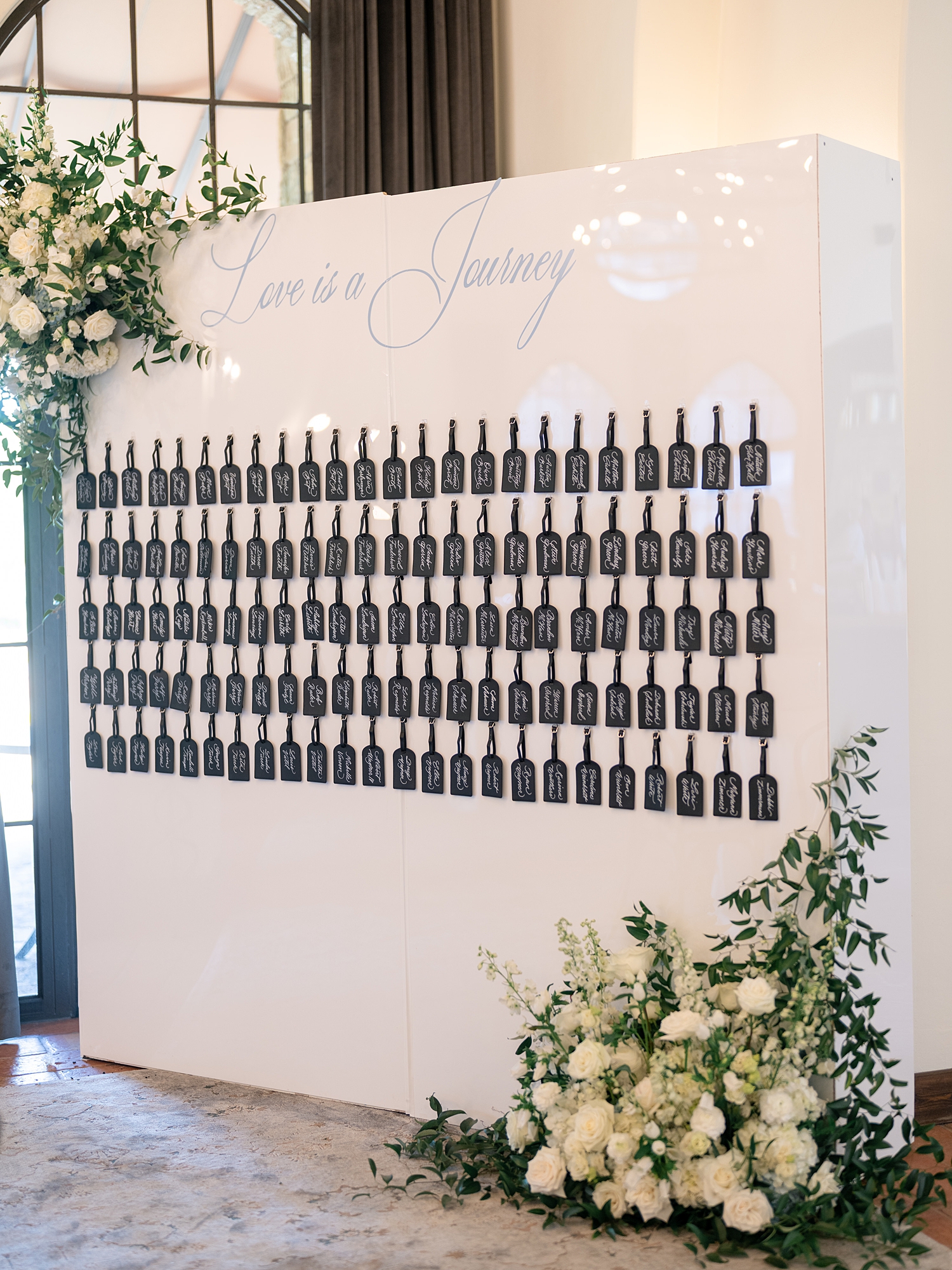 Reception tablescape with elegant linens, florals and candles at Escondido Golf Club