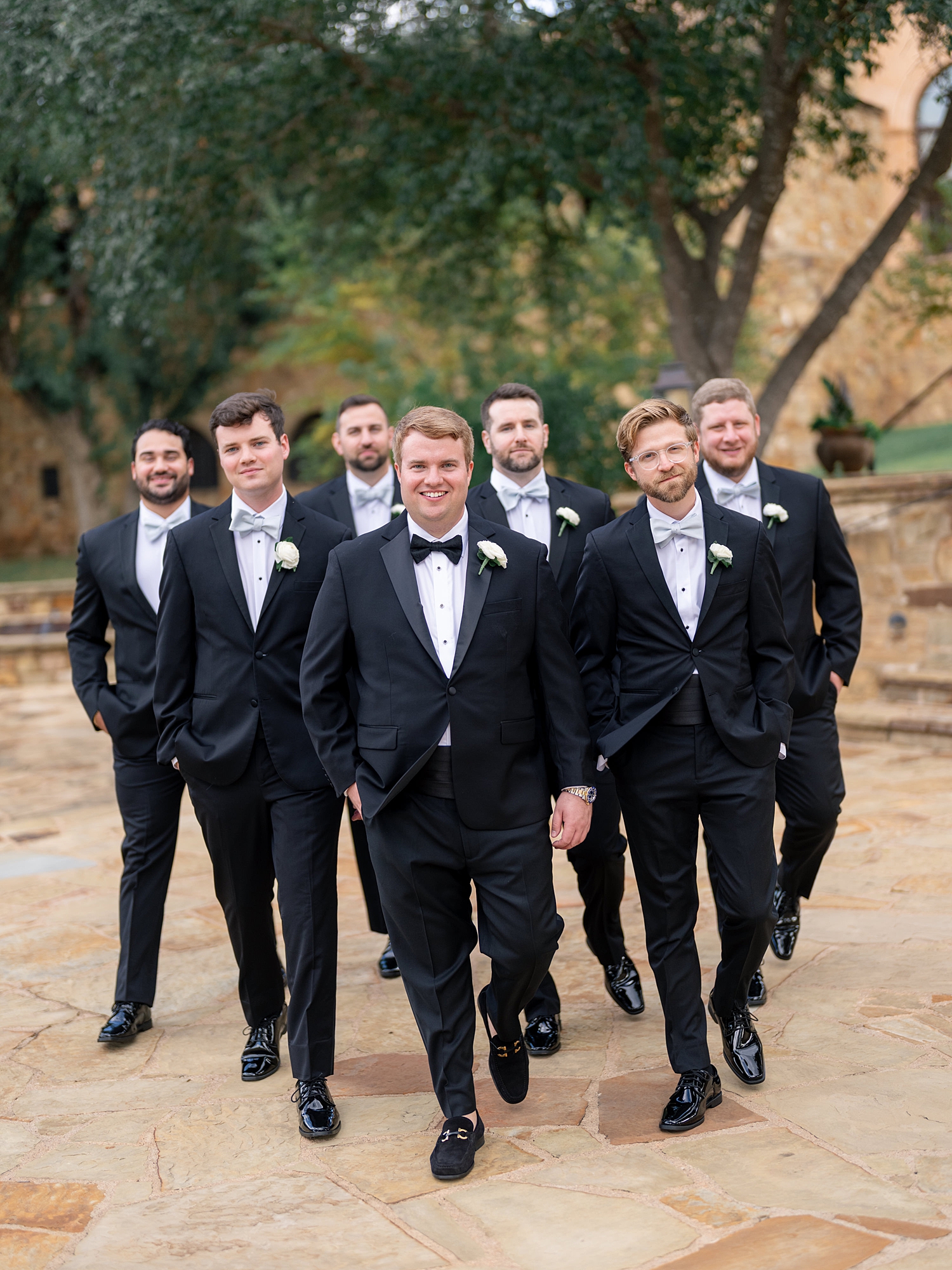 joyful wedding party portrait at Escondido Golf Club, Austin wedding photography by Paige Vaughn Photo
