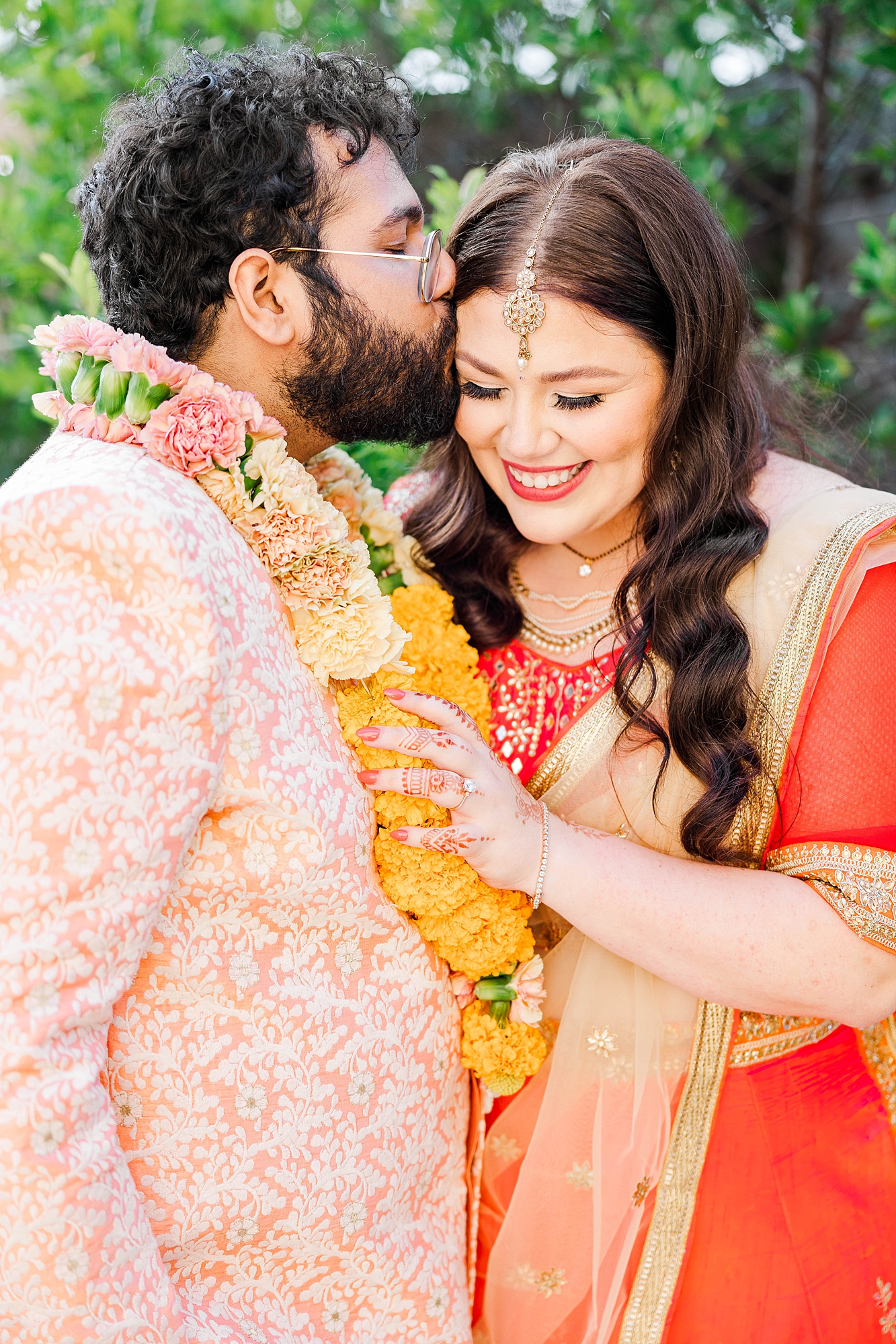 Joyful portrait of bride and groom mid-celebration at their fall wedding weekend in Texas