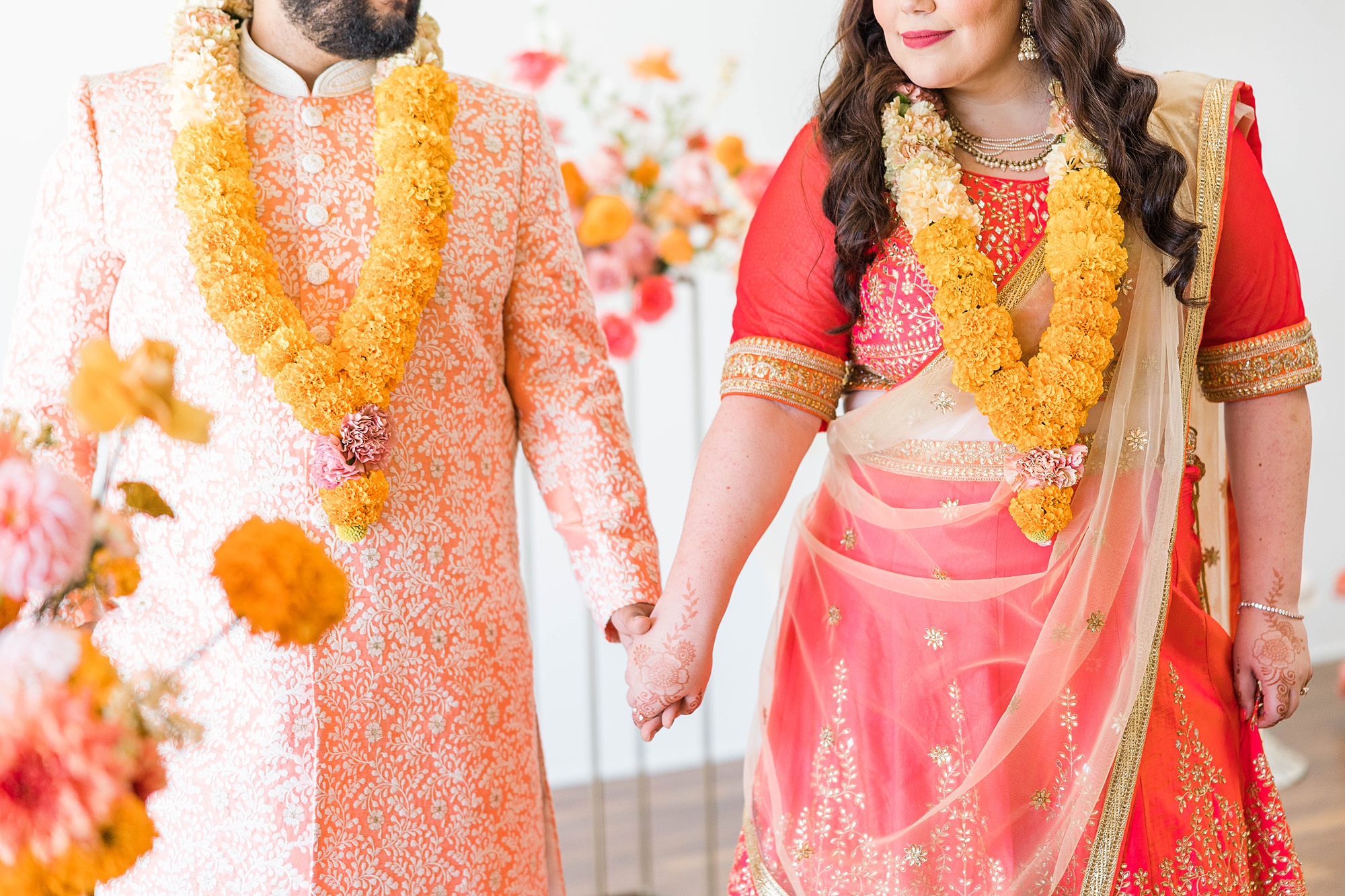 Joyful portrait of bride and groom mid-celebration at their fall wedding weekend in Texas