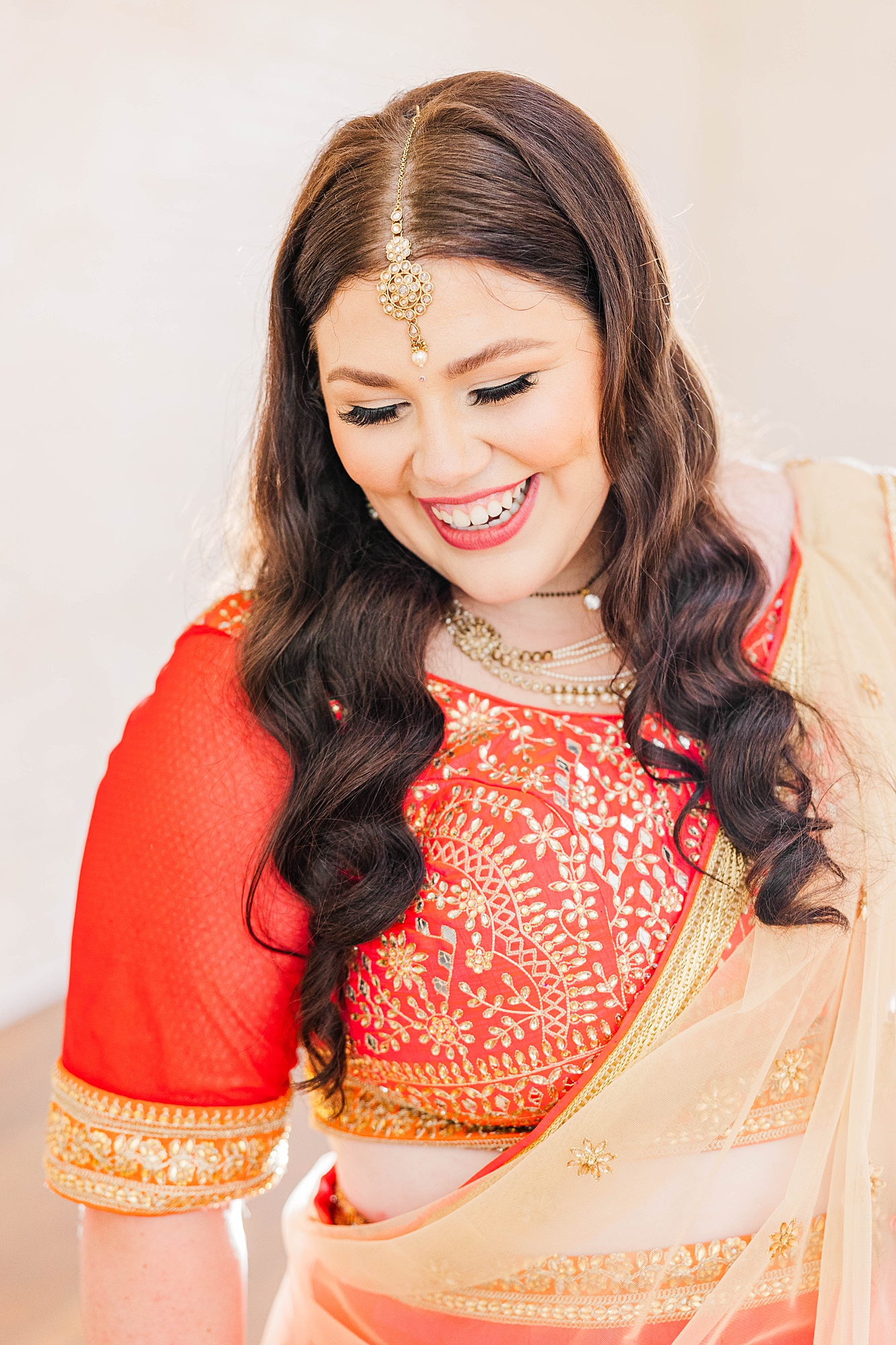 Joyful portrait of bride and groom mid-celebration at their fall wedding weekend in Texas
