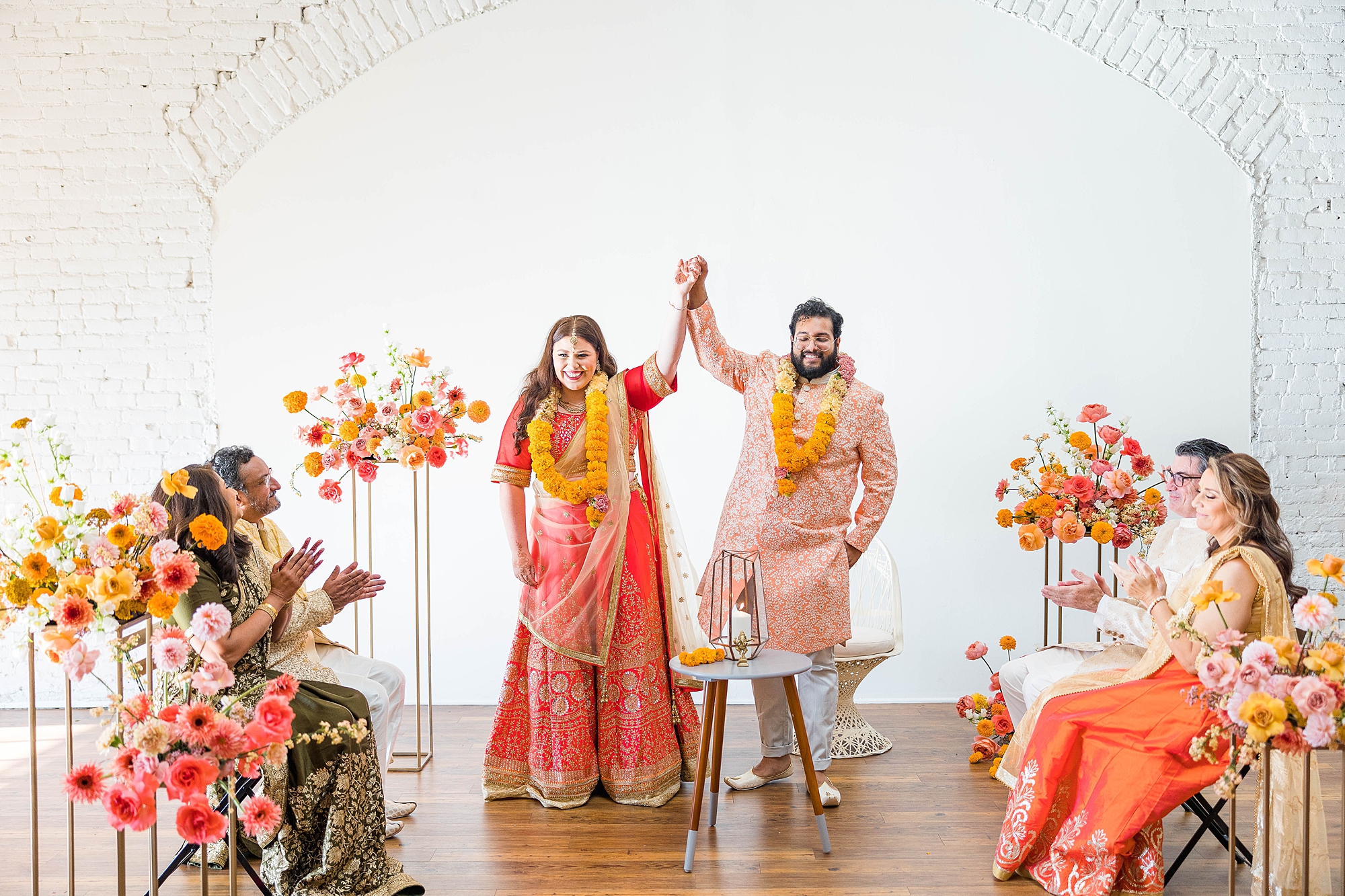 Joyful portrait of bride and groom mid-celebration at their fall wedding weekend in Texas