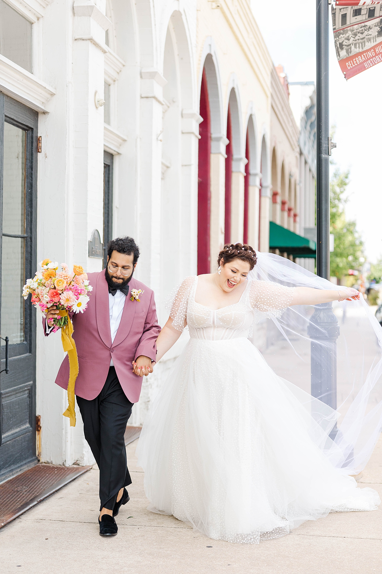 Autumn wedding ceremony with deep jewel tones, fun patterns and joyful family moments, bride and groom portraits