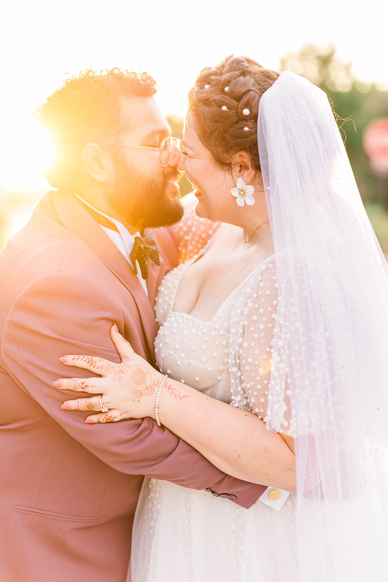 Autumn wedding ceremony with deep jewel tones, fun patterns and joyful family moments, bride and groom portraits