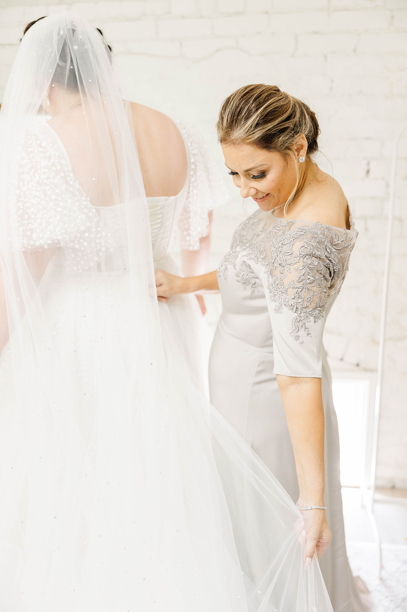 Autumn wedding ceremony with deep jewel tones, fun patterns and joyful family moments