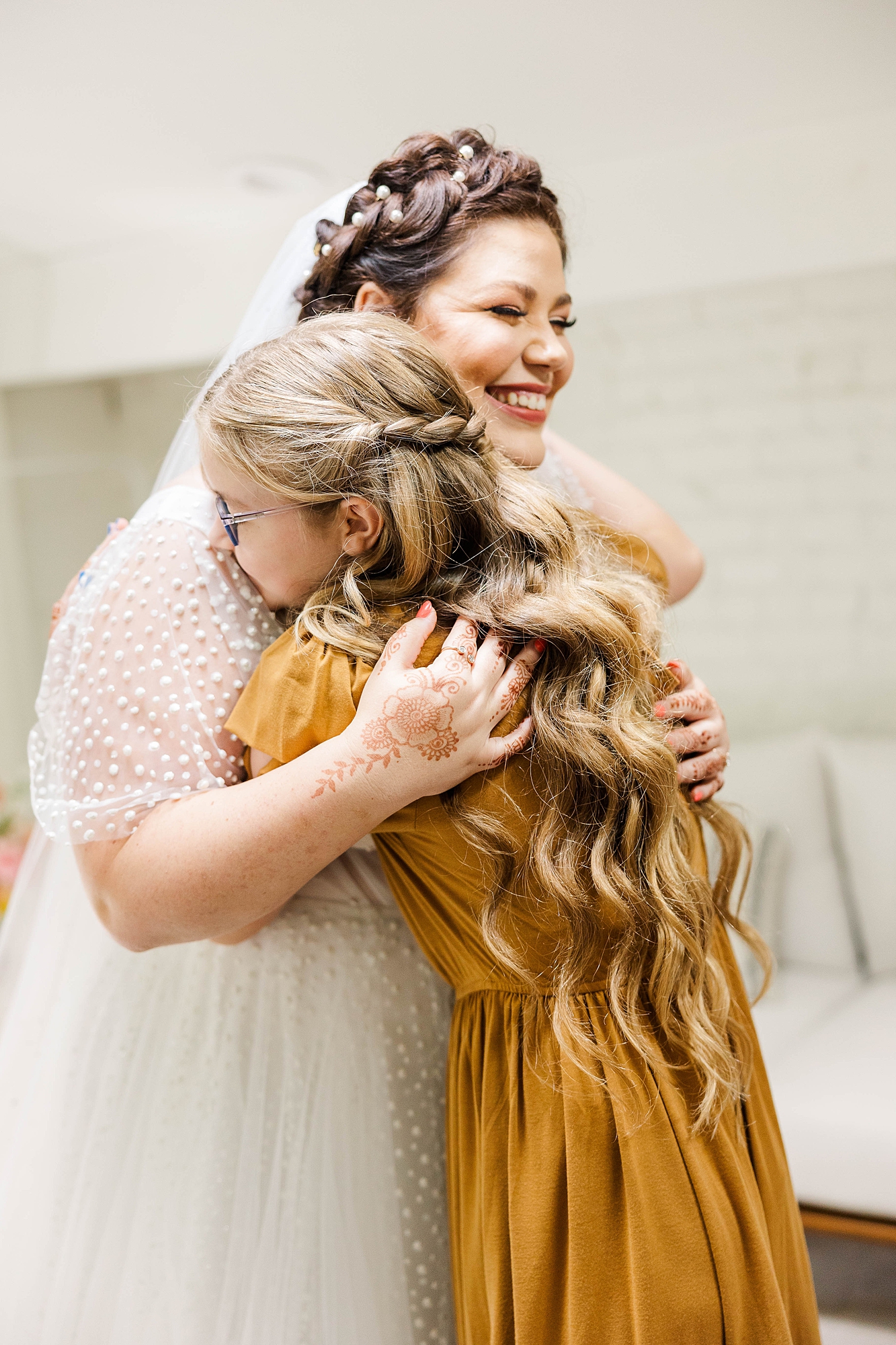 Autumn wedding ceremony with deep jewel tones, fun patterns and joyful family moments