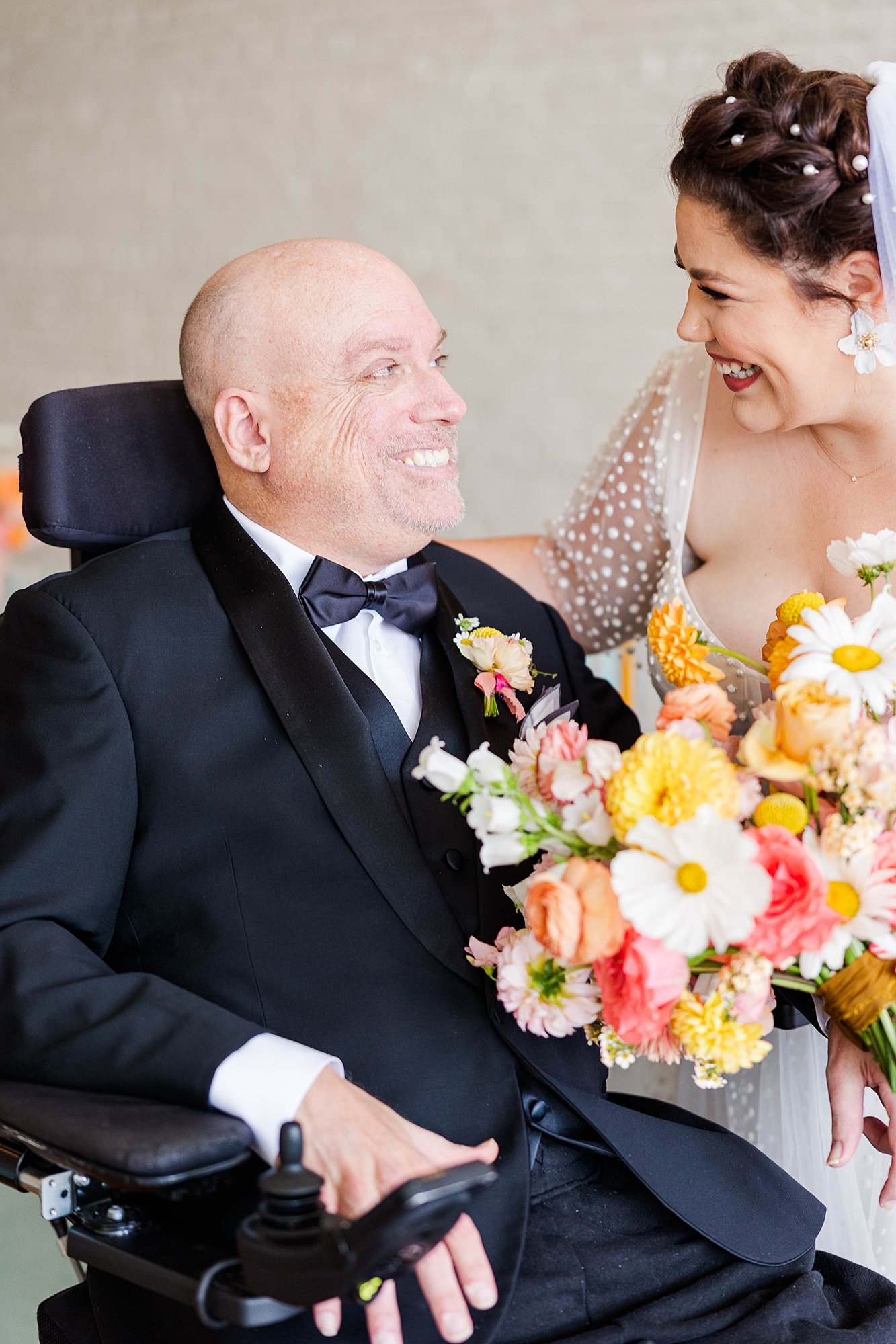 Autumn wedding ceremony with deep jewel tones, fun patterns and joyful family moments