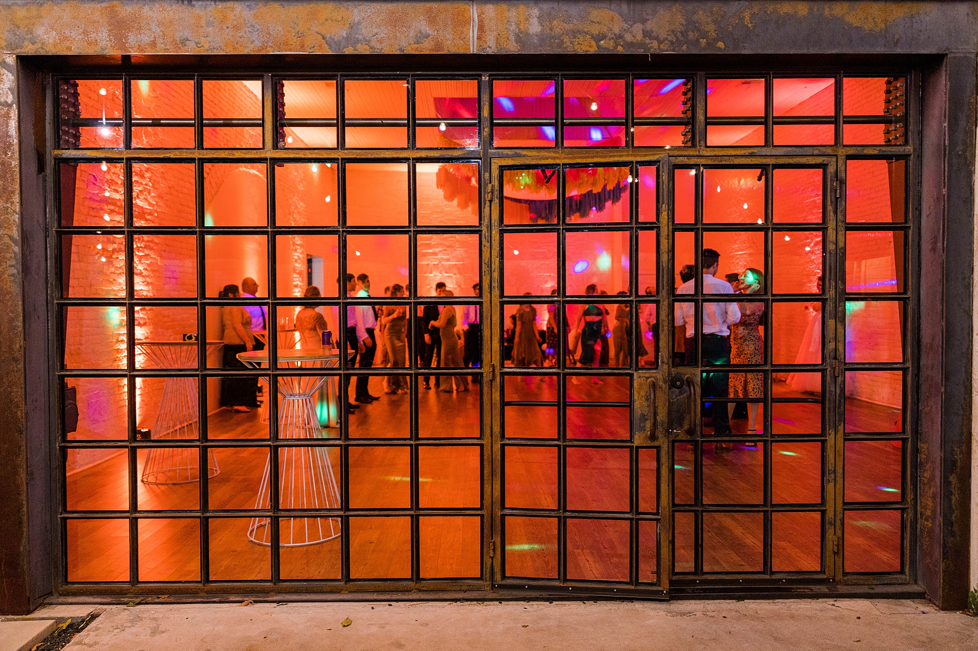 Joyful portrait of bride and groom mid-celebration at their fall wedding weekend in Texas