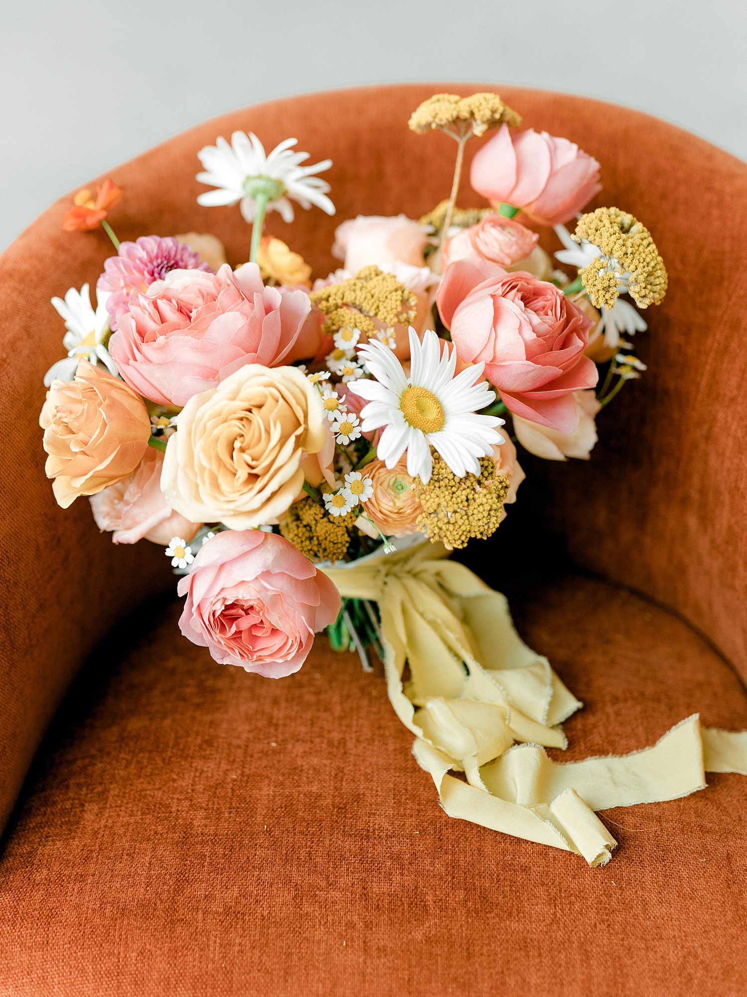 Autumn wedding ceremony with deep jewel tones, fun patterns and joyful family moments