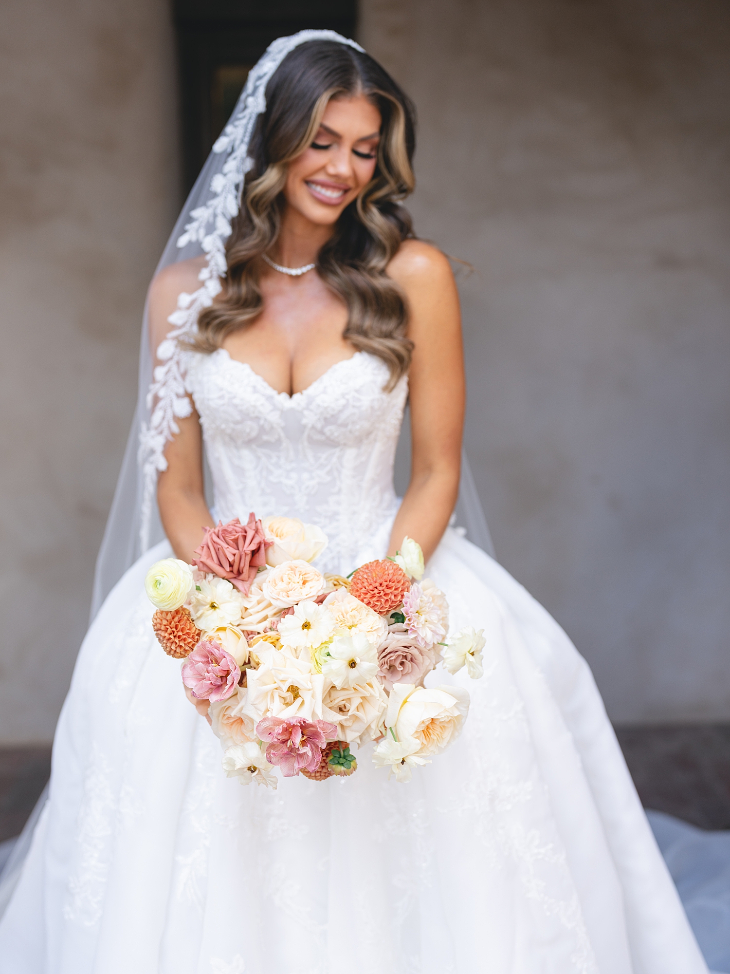 Bridal portrait under Spanish-mission style architecture in San Antonio