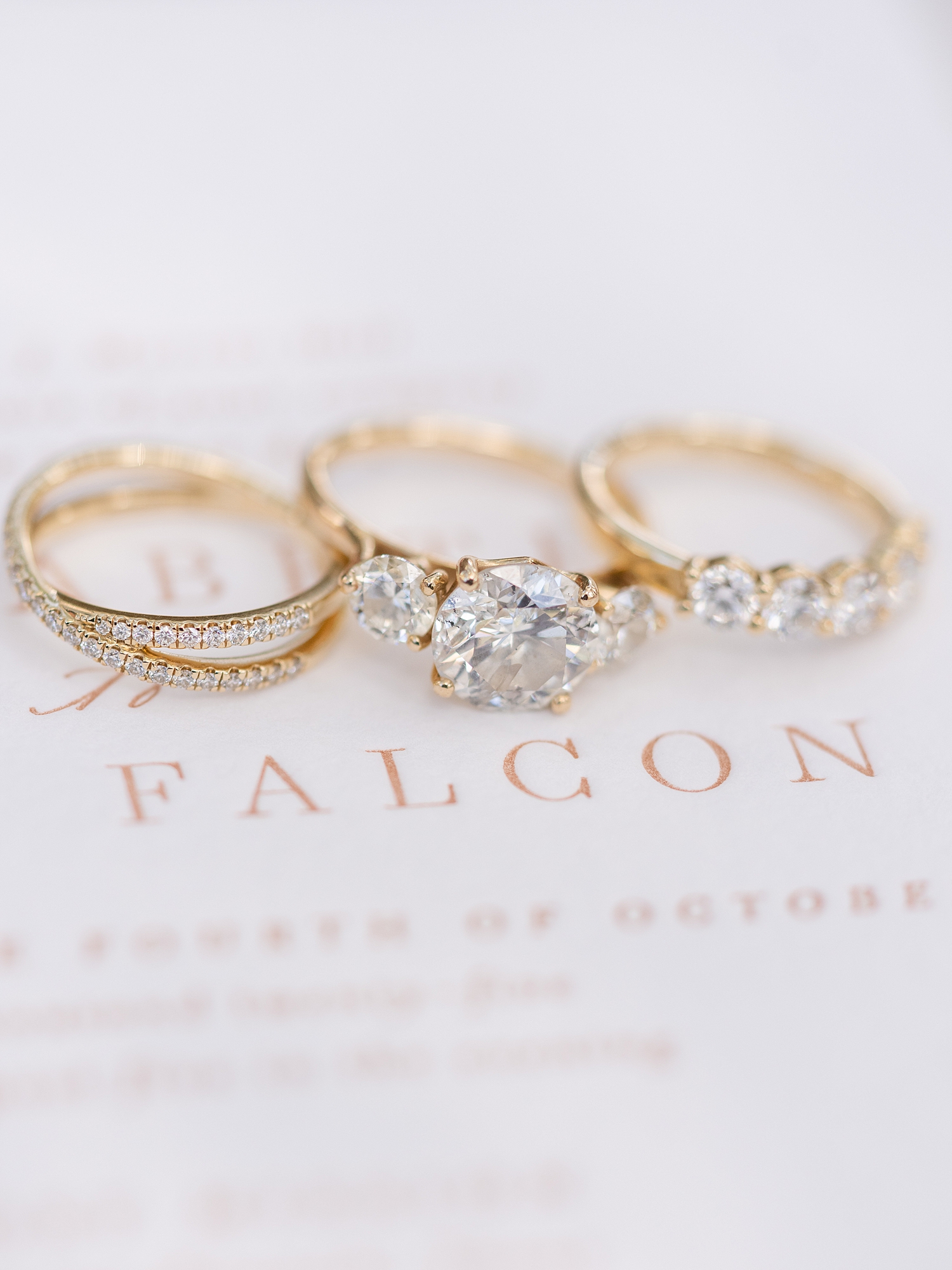 Detail shot of wedding rings and invitation suite at San Antonio wedding by Paige Vaughn Photo