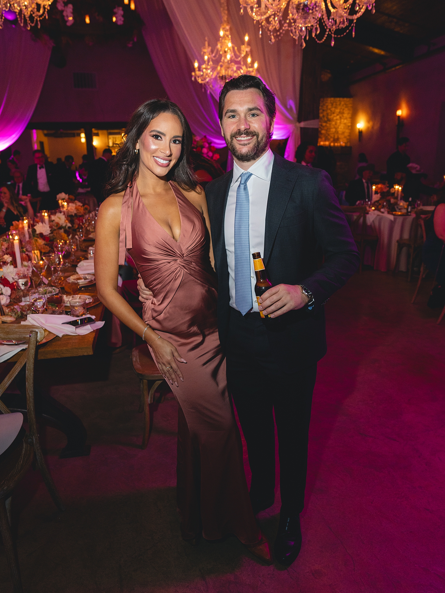 wedding guests dancing and celebrating on the reception dance floor at San Antonio wedding celebration