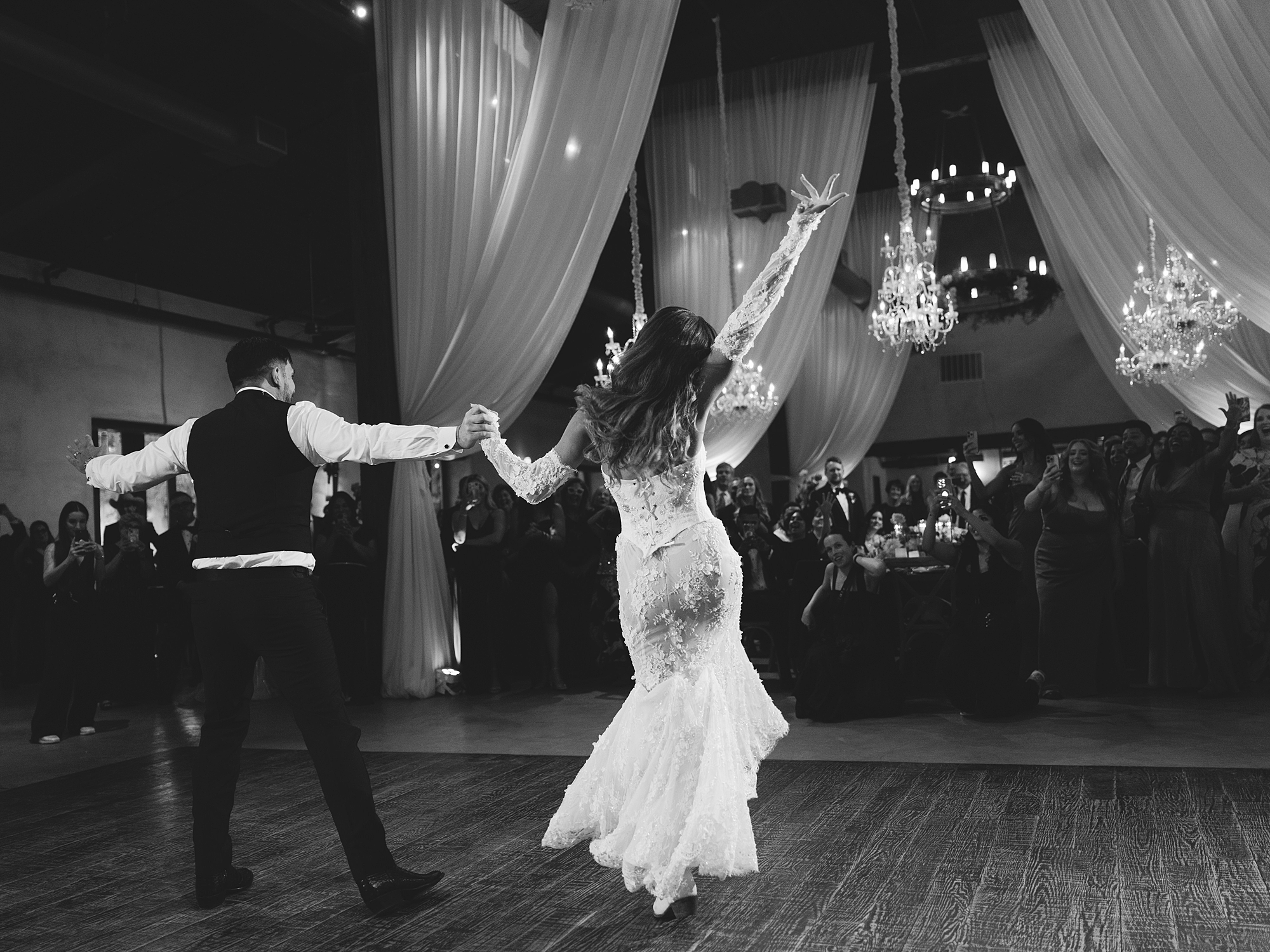 Couple’s first dance in warm evening light at San Antonio reception by Paige Vaughn Photo