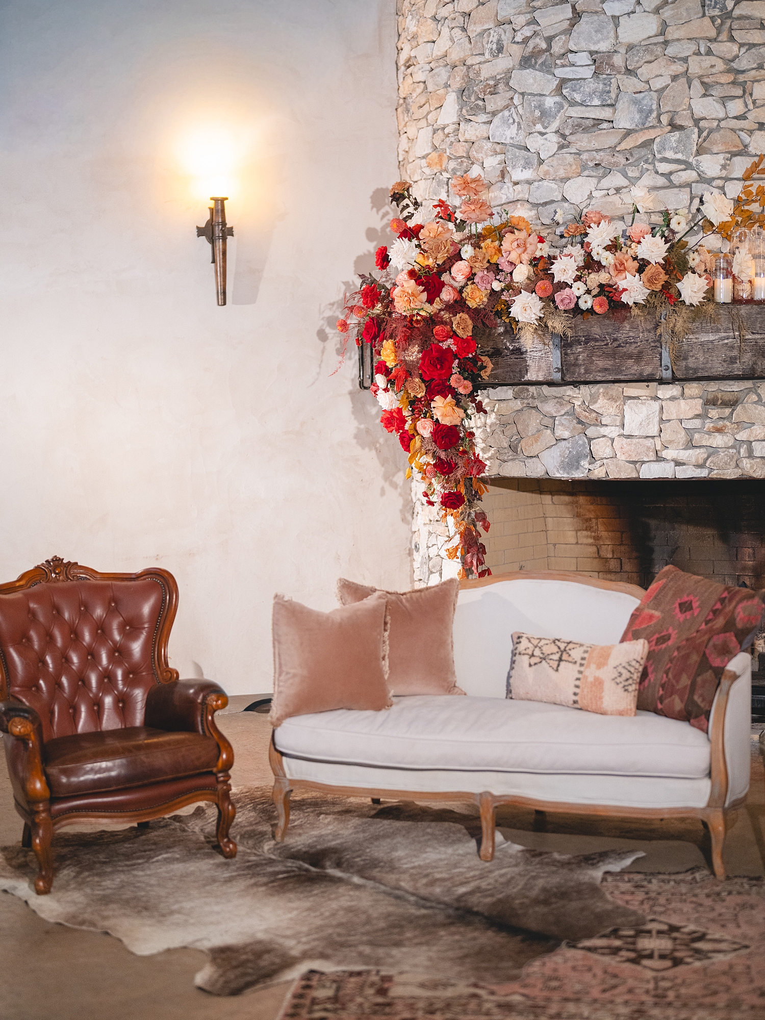 Reception tablescape with lush florals, elegant linens, and candlelight at San Antonio wedding