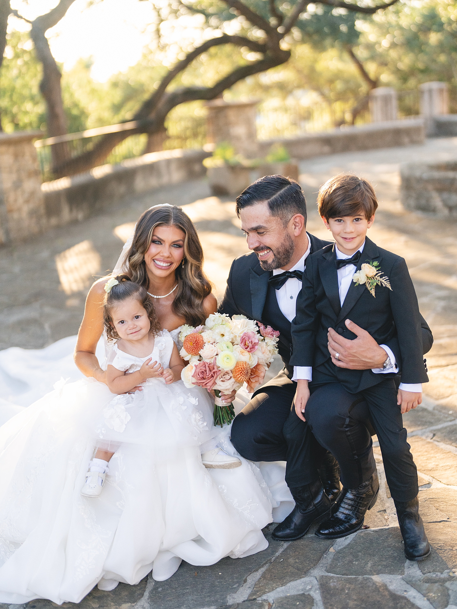 Bride and groom portrait under Spanish-mission style architecture in San Antonio