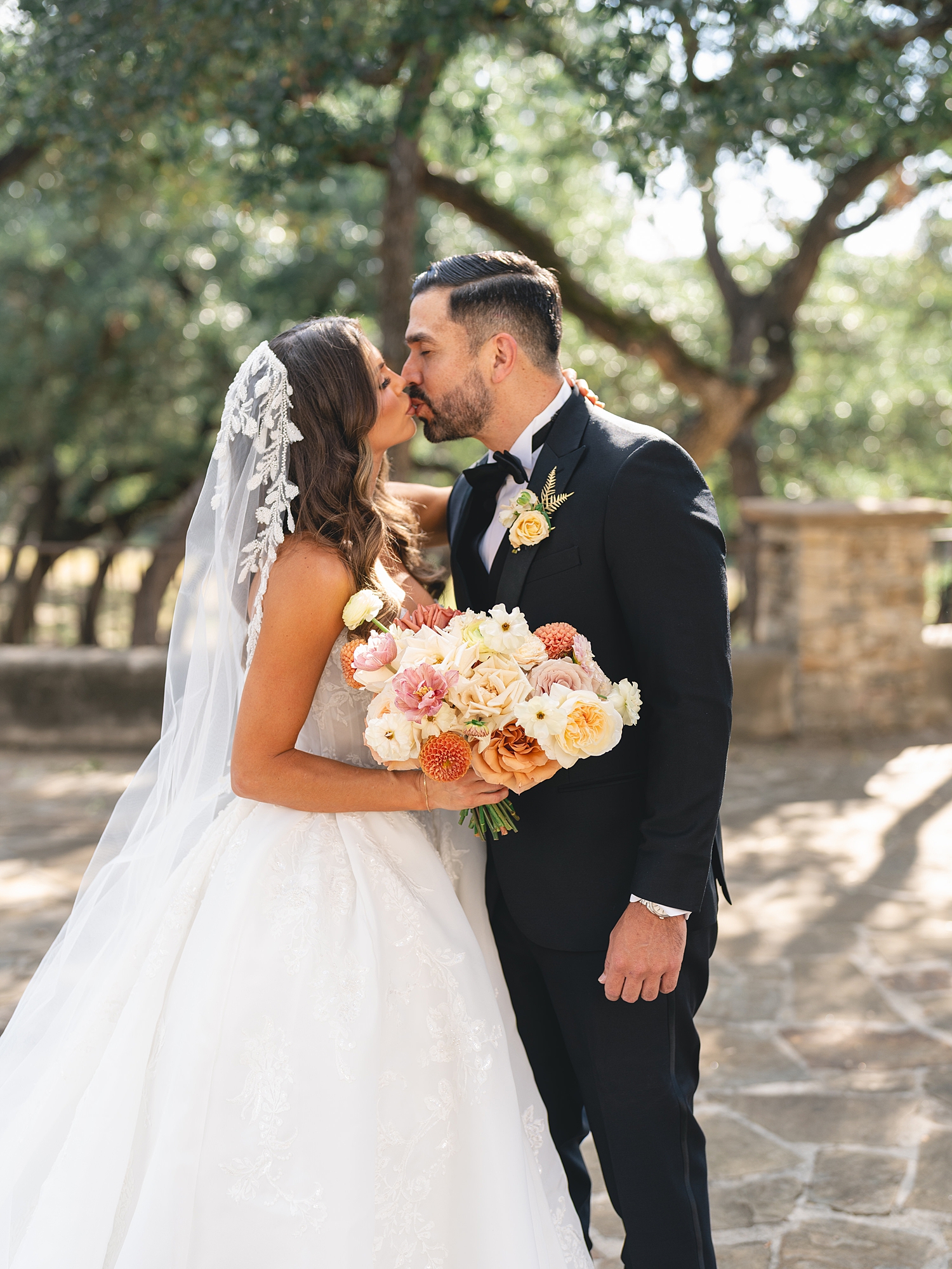 romantic bride and groom portrait under trees