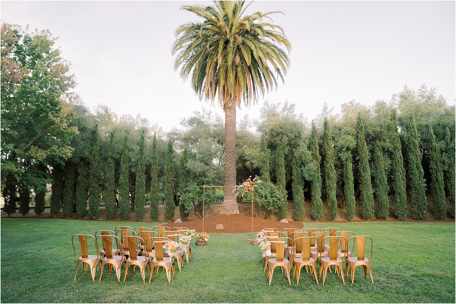 green and gold minimal palm ceremony decor 