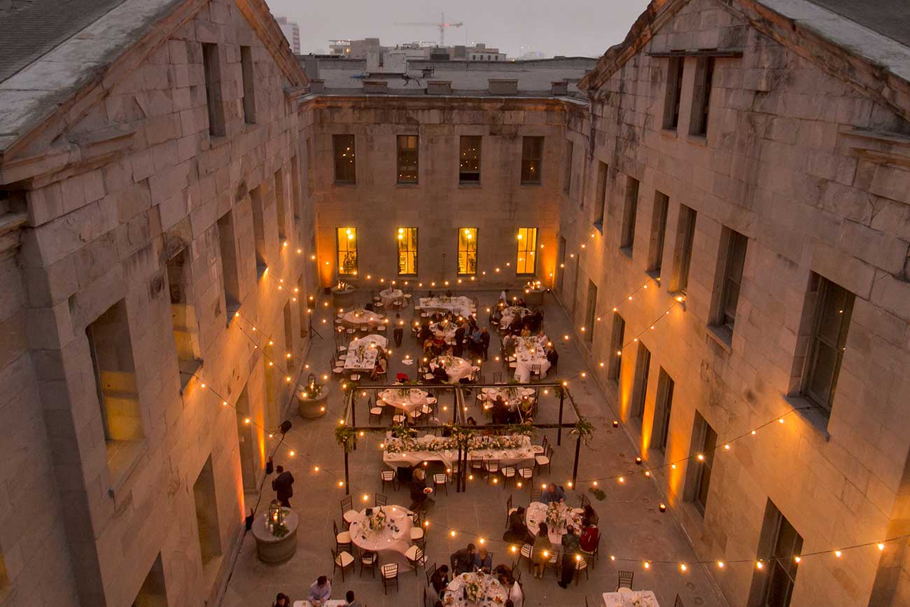Beautiful outdoor reception with twinkle light in the San Francisco Mint courtyard, one of the best San Francisco wedding venues