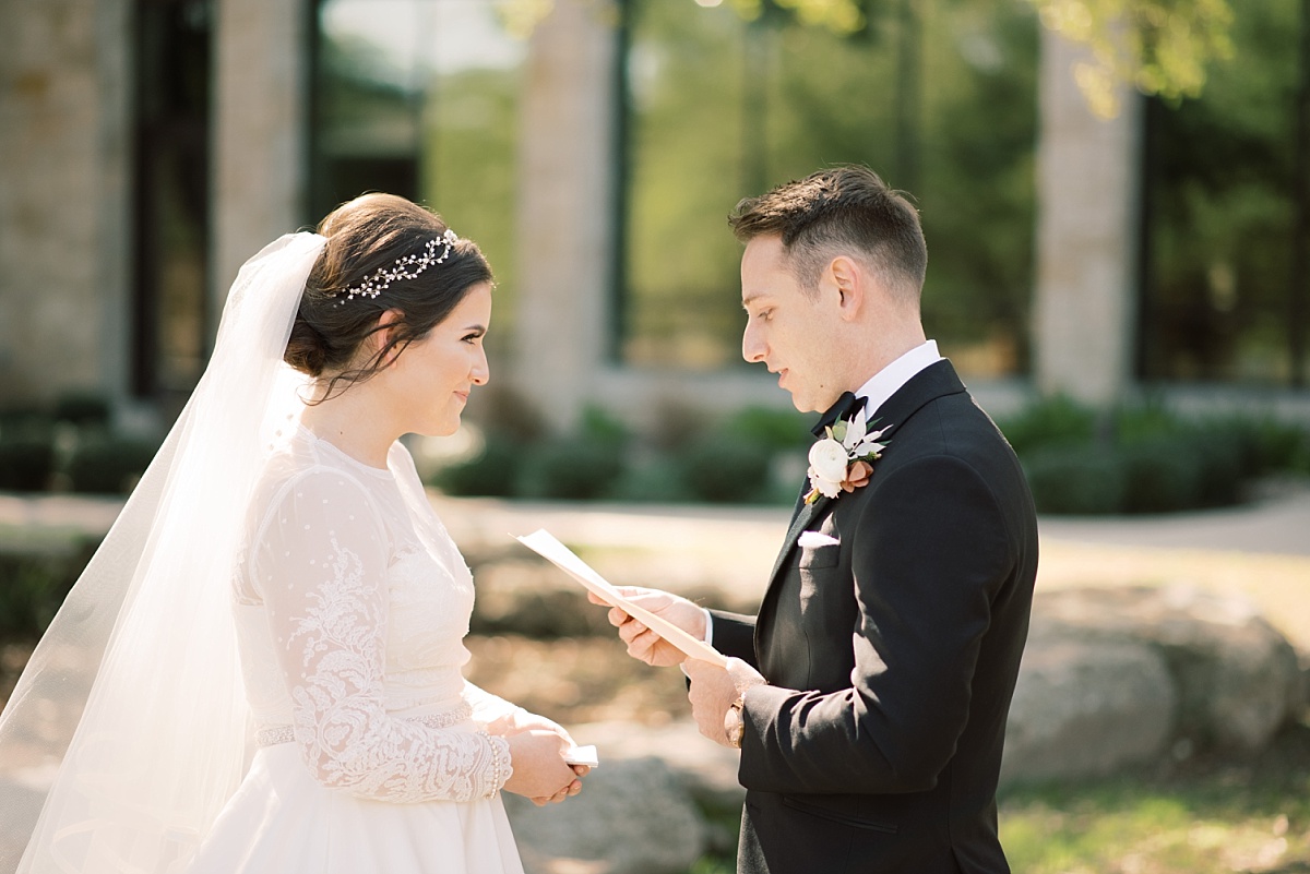 Newlywed couple exchanging vows privately while having wedding photos taken by Paige Vaughn Photography