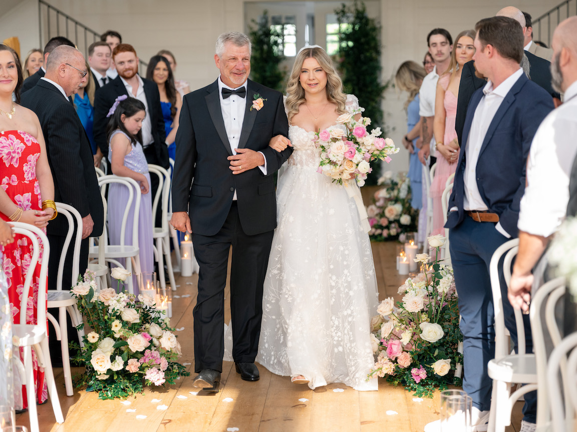 Arrowhead Hill Wedding ceremony with lush florals