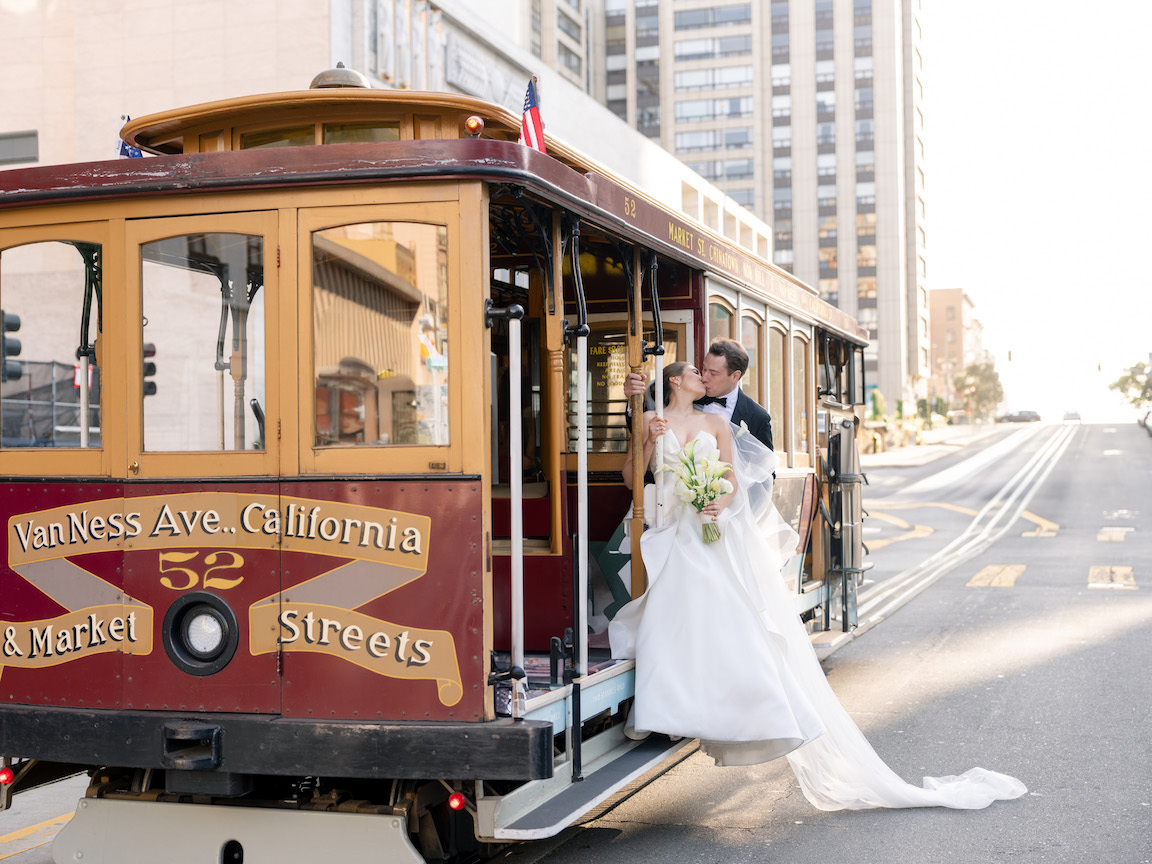 Fairmont San Francisco Wedding bride and groom portraits on trolley