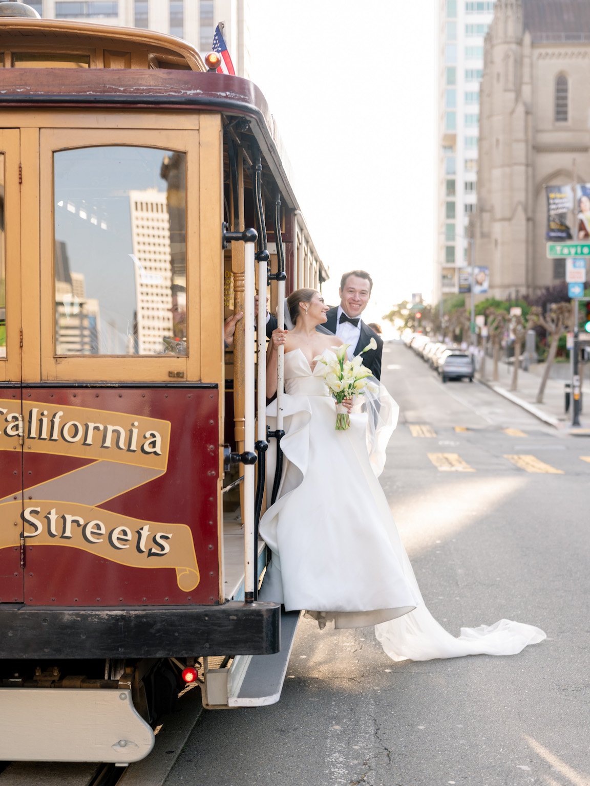 Fairmont San Francisco Wedding bride and groom portraits on trolley