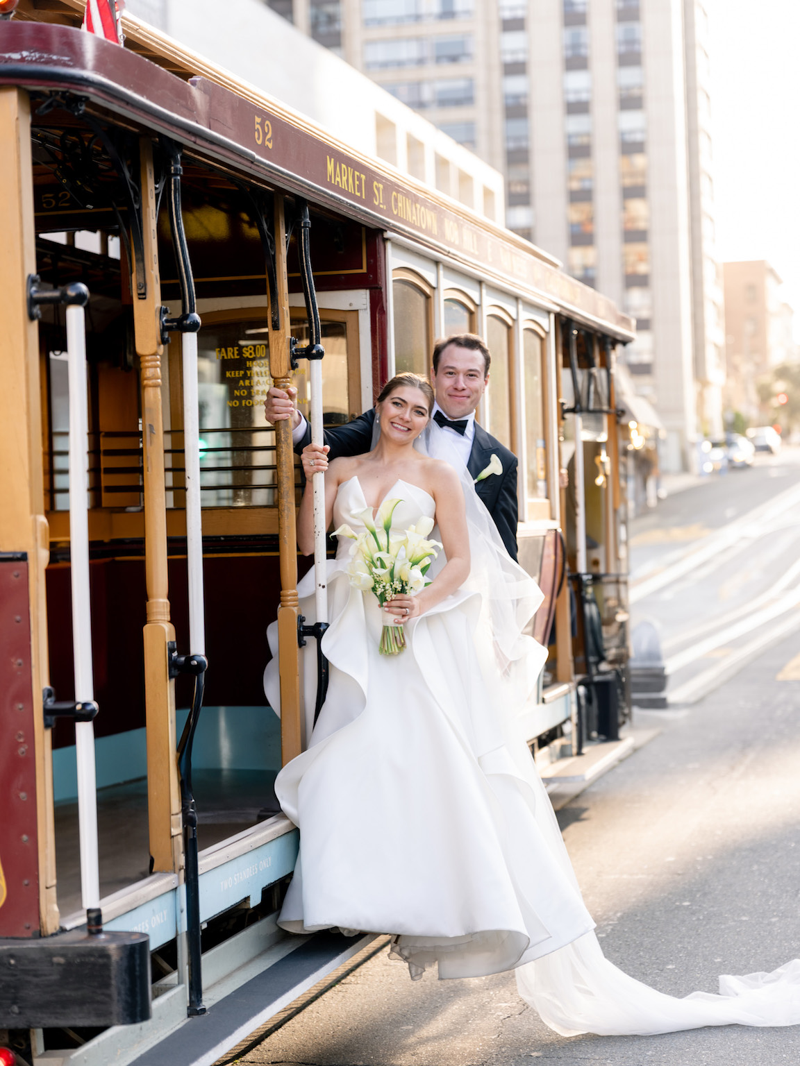 Fairmont San Francisco Wedding bride and groom portraits on trolley