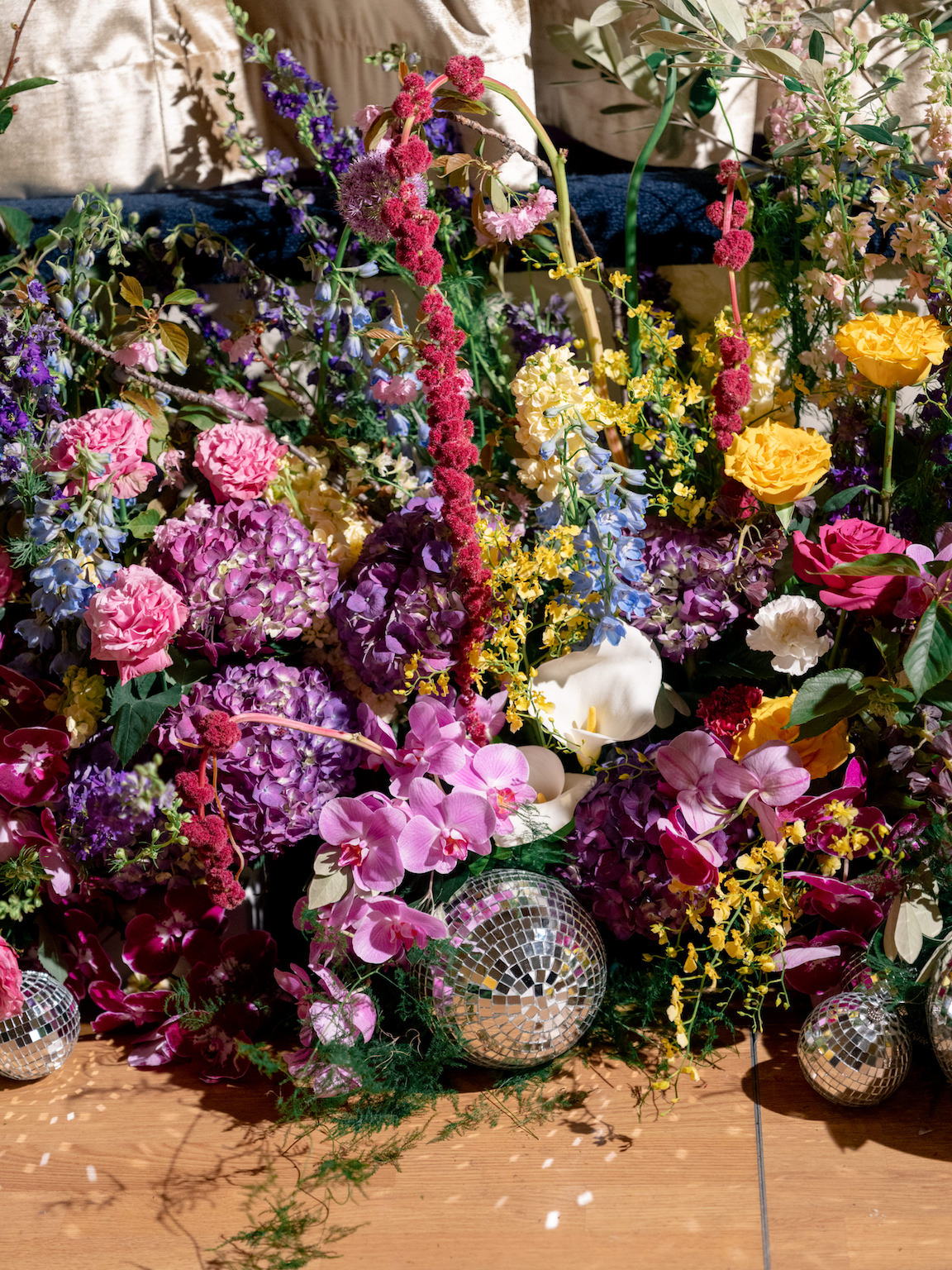 Fairmont San Francisco Wedding reception table lush florals and vibrant colors